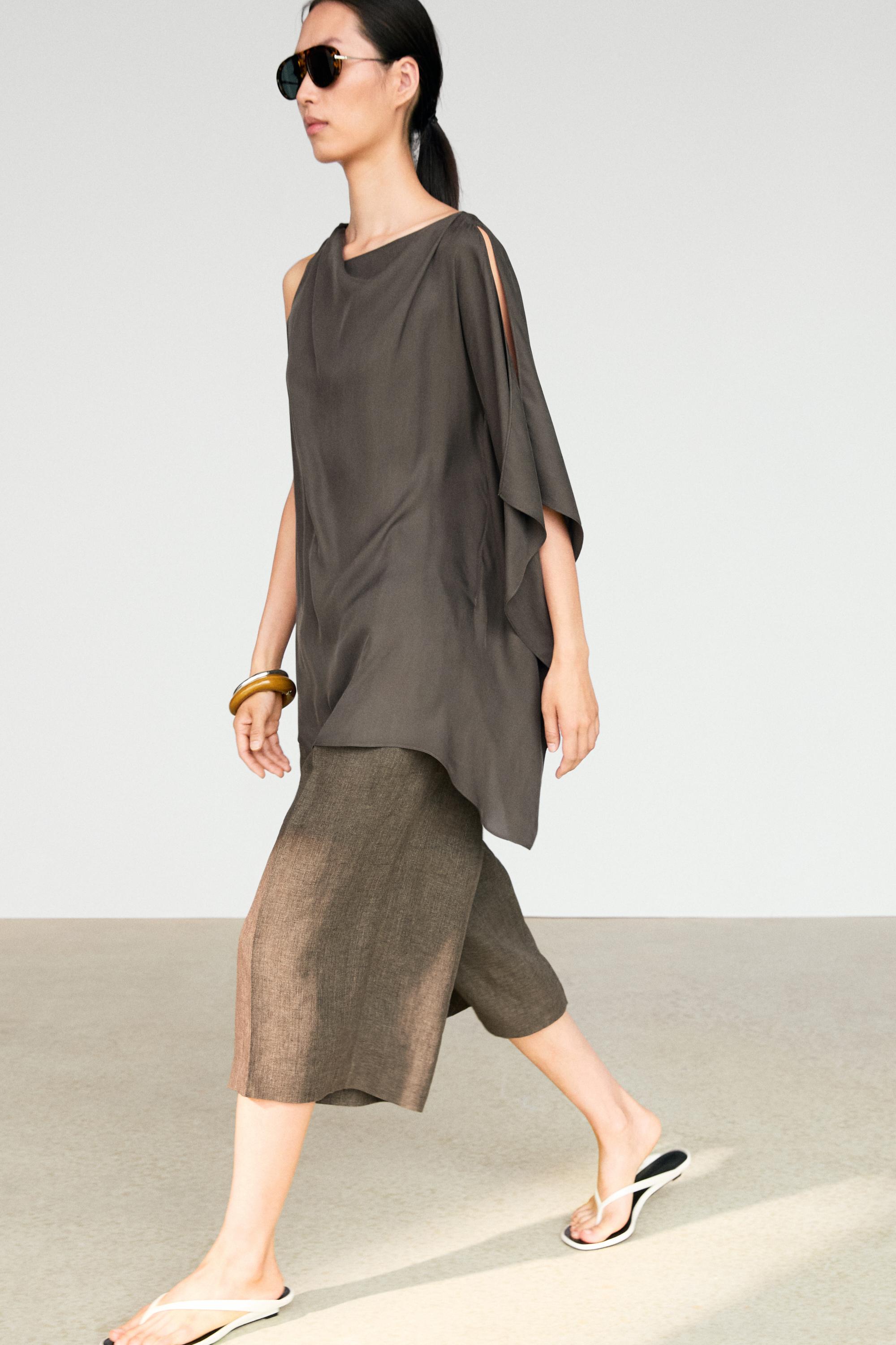 Asymmetrisches fließendes Cape-Top