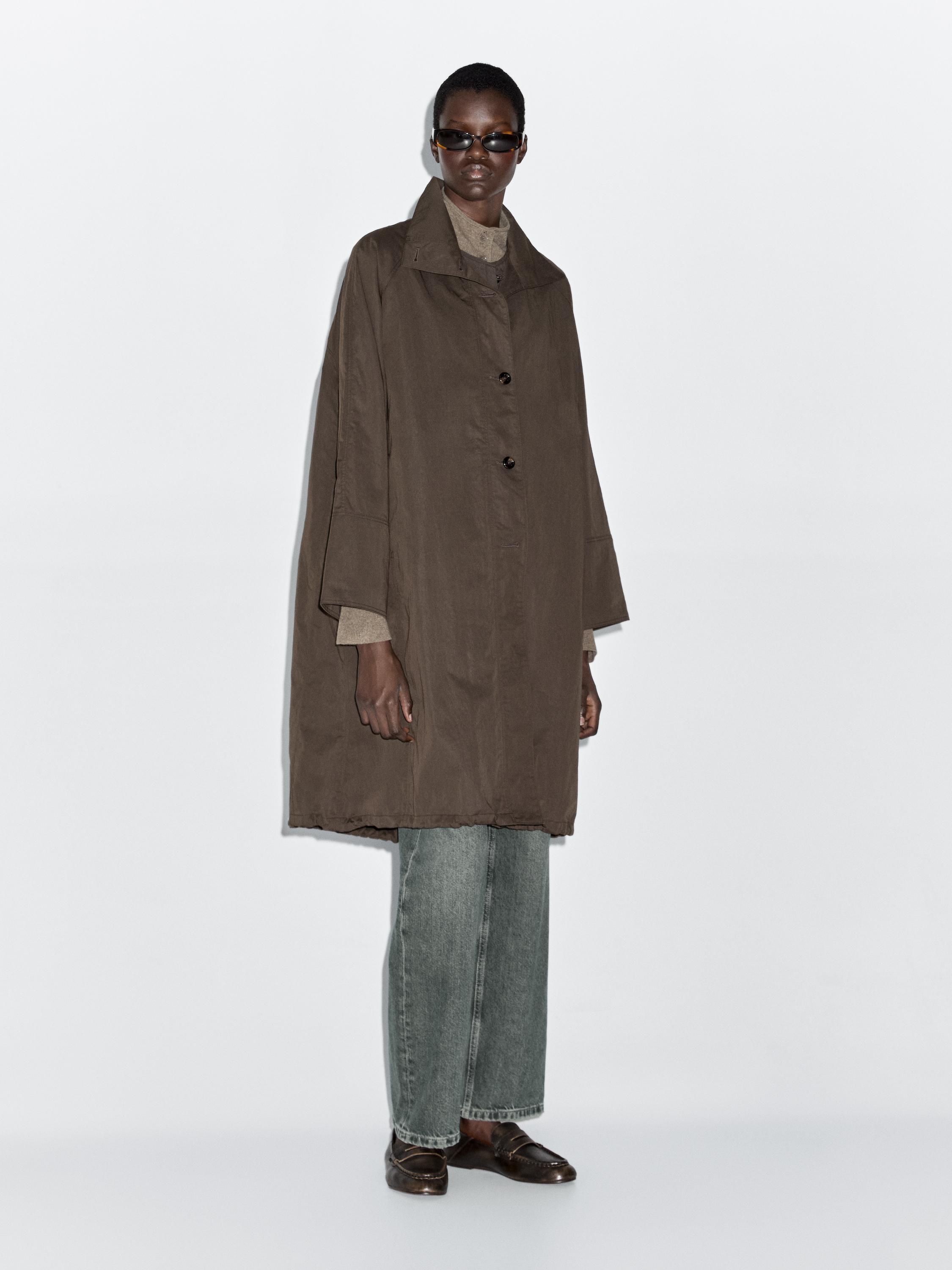 Long parka with puff technical fabric detail