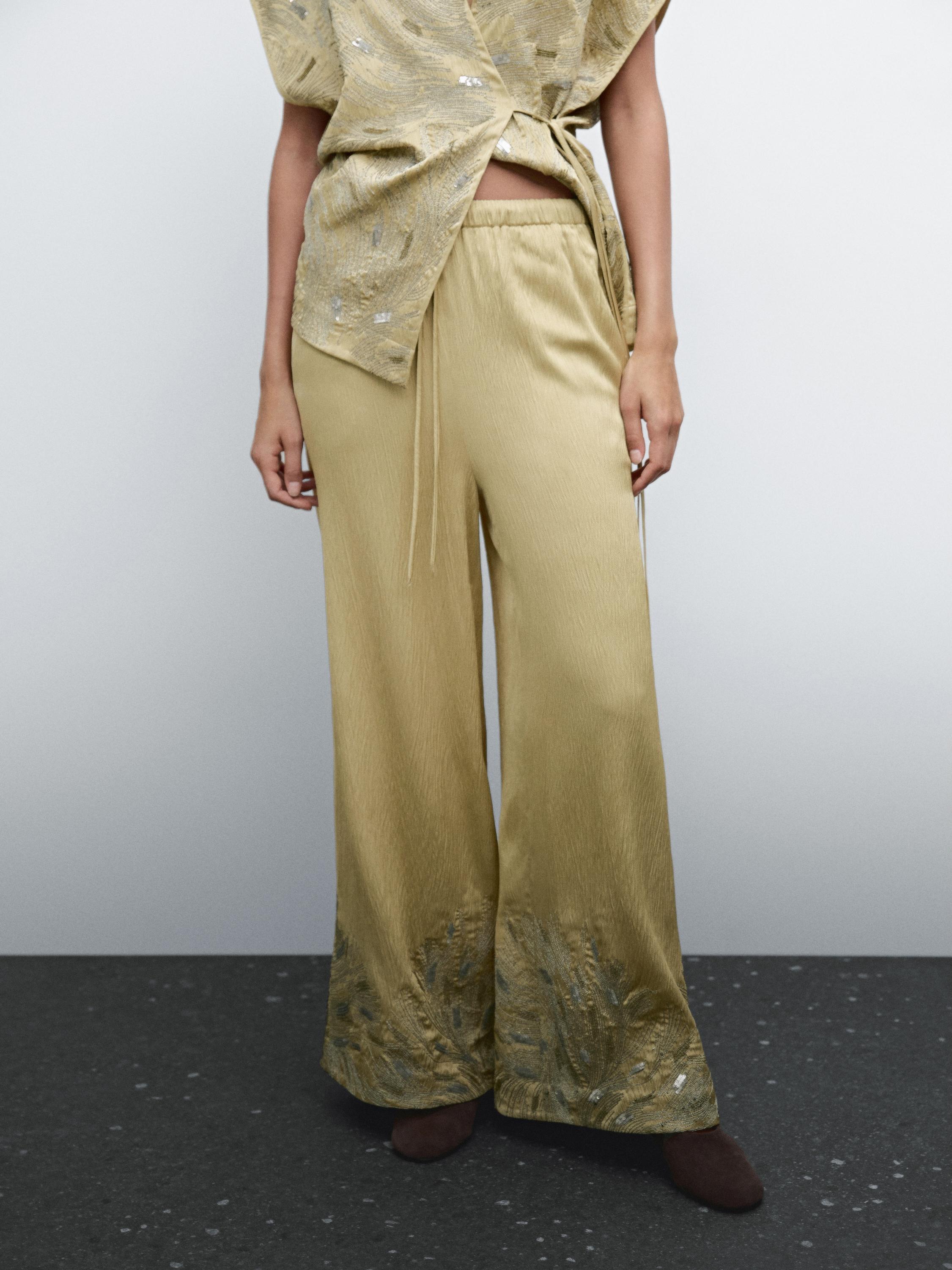 Flowing wide-leg embroidered trousers