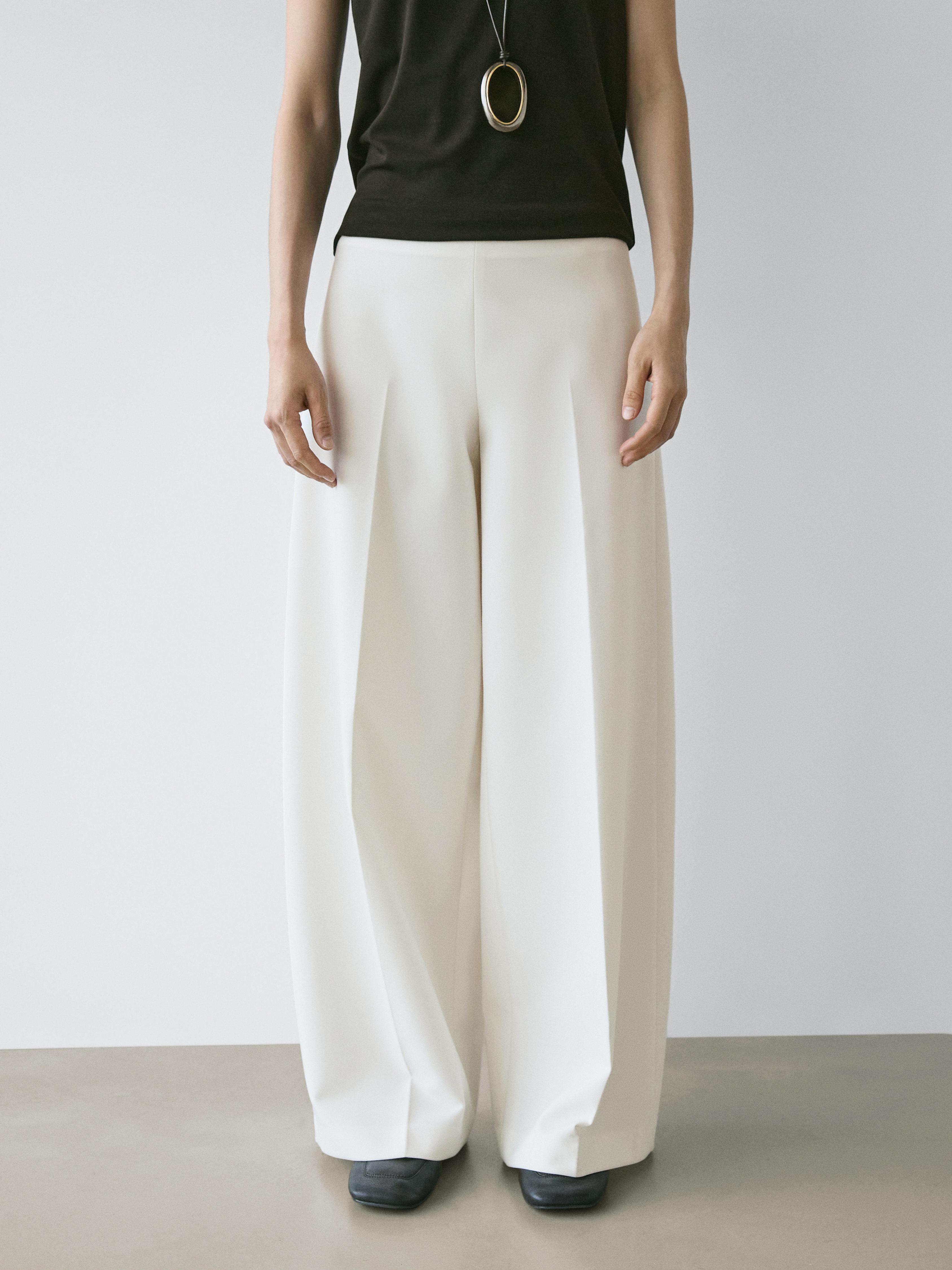 Wide-leg voluminous trousers — CREAM