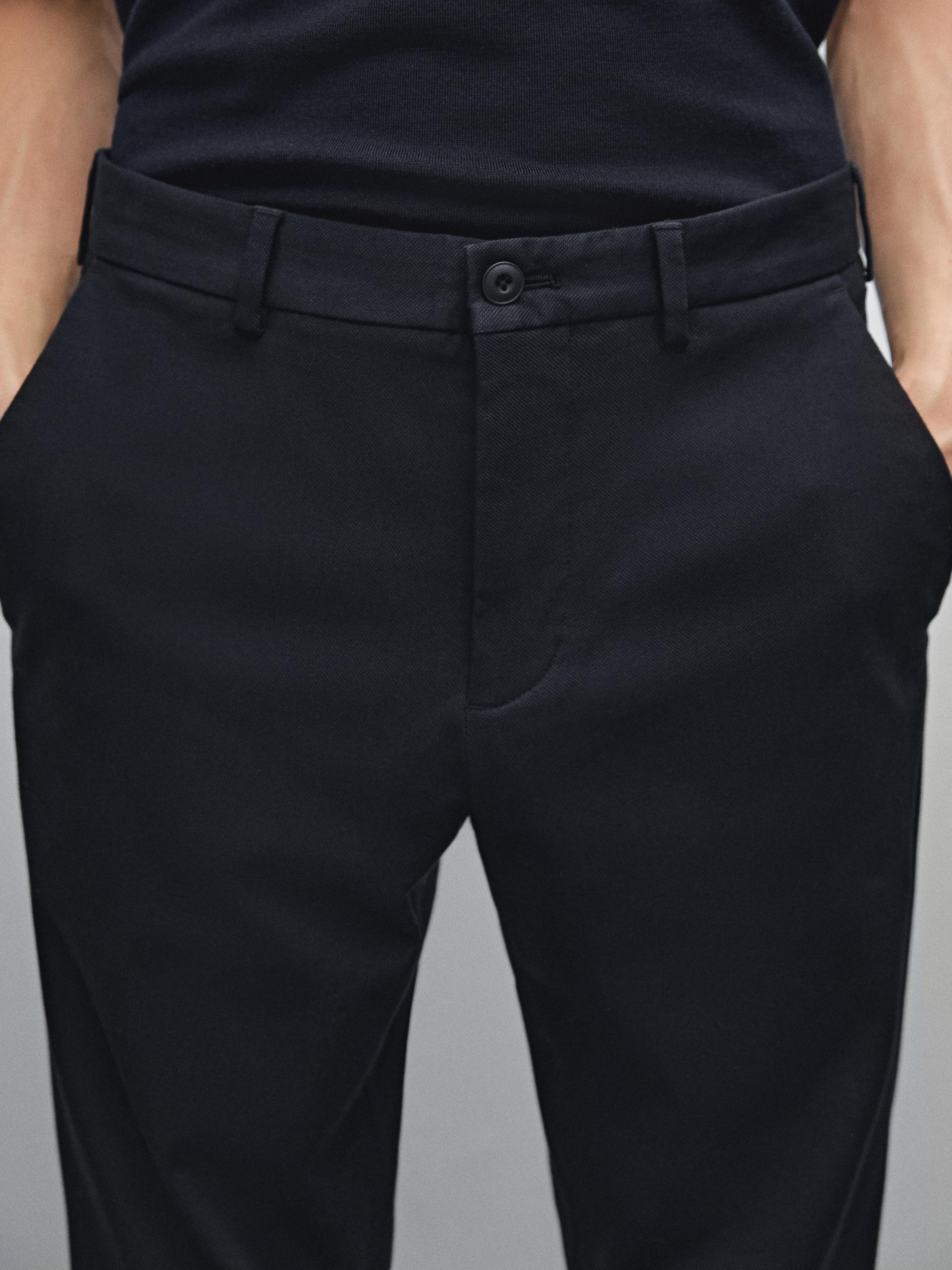 Cotton blend textured slim fit trousers
