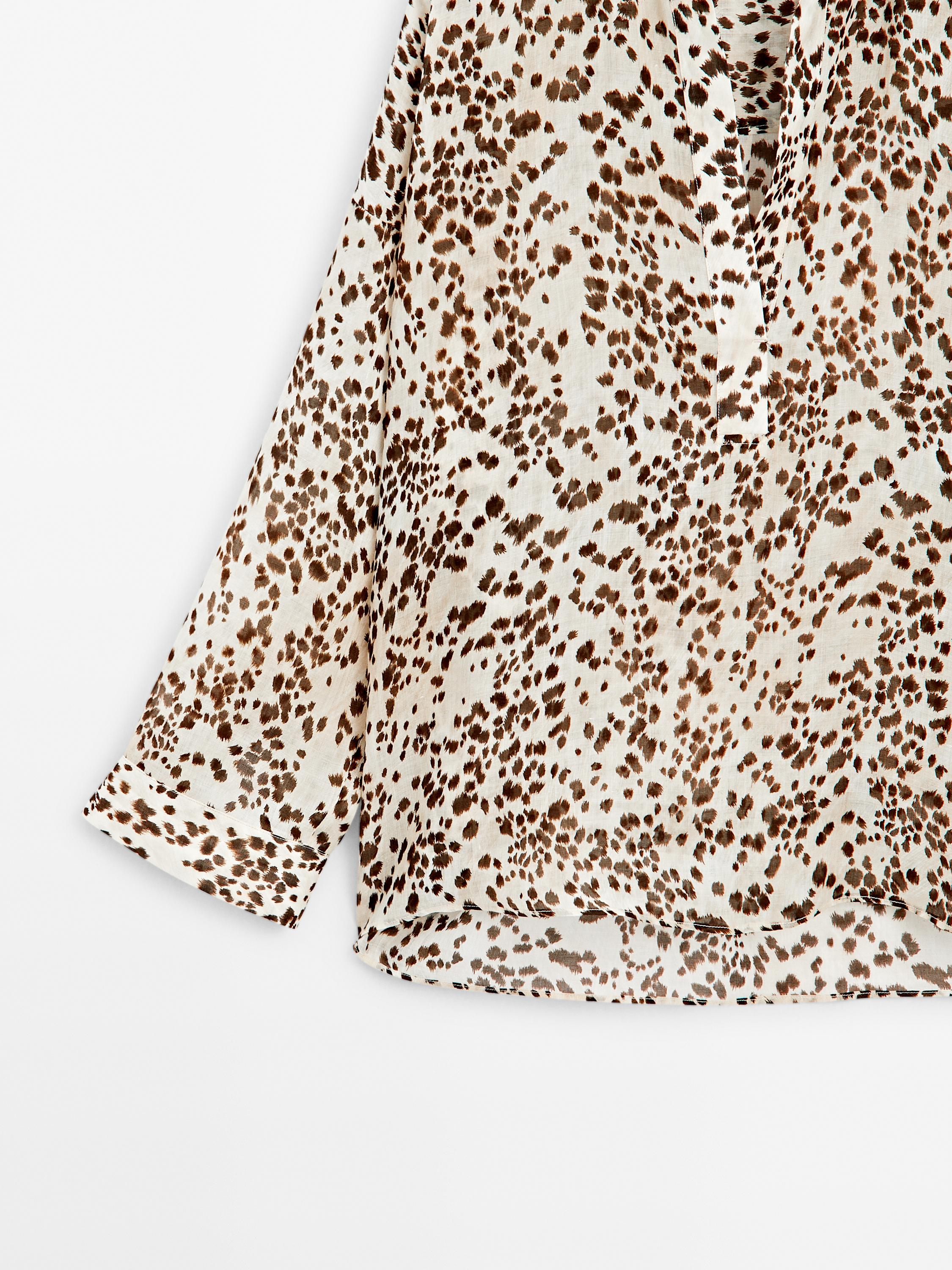 Oversized blouse met dierenprint