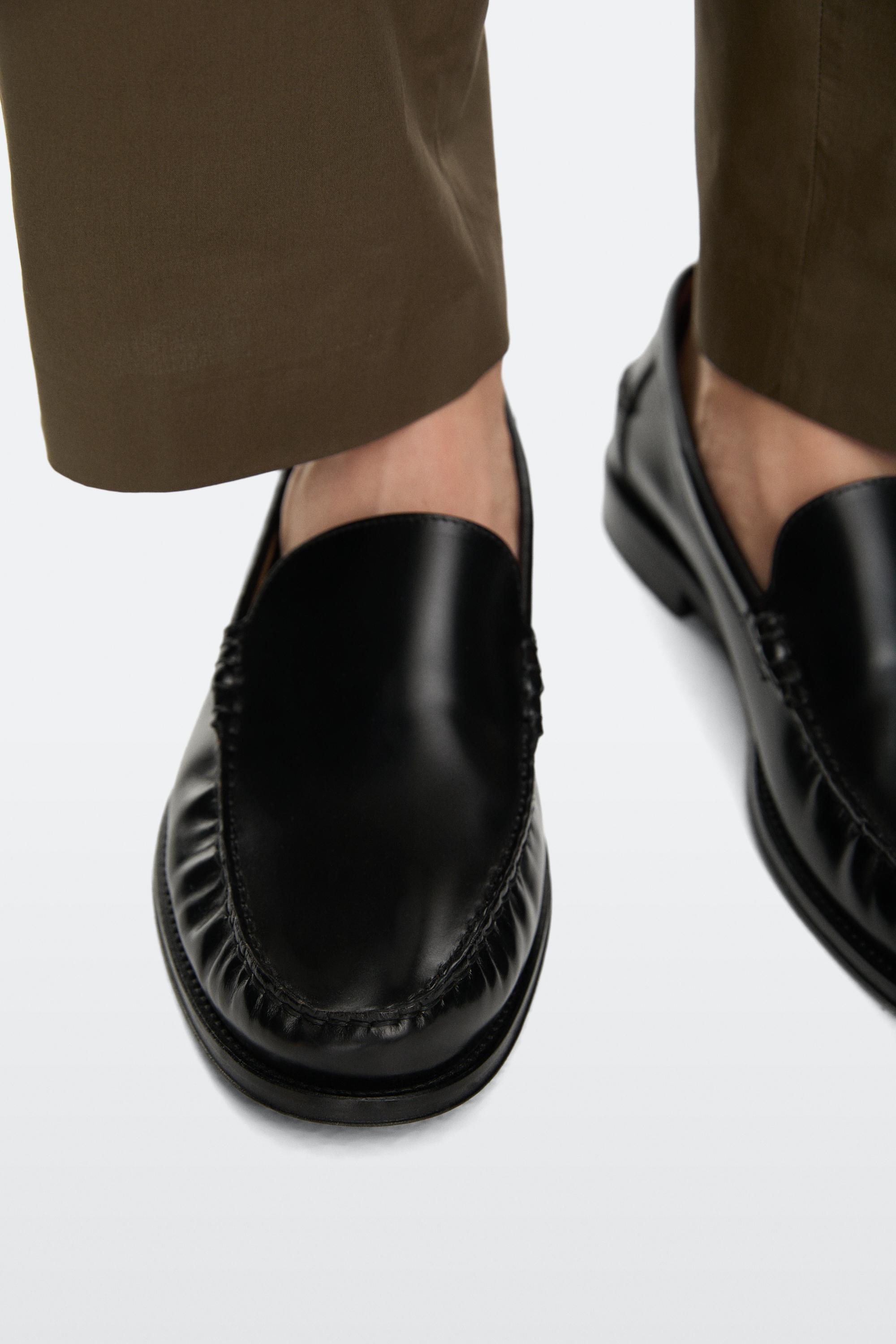Leather loafers with glossy finish — BLACK