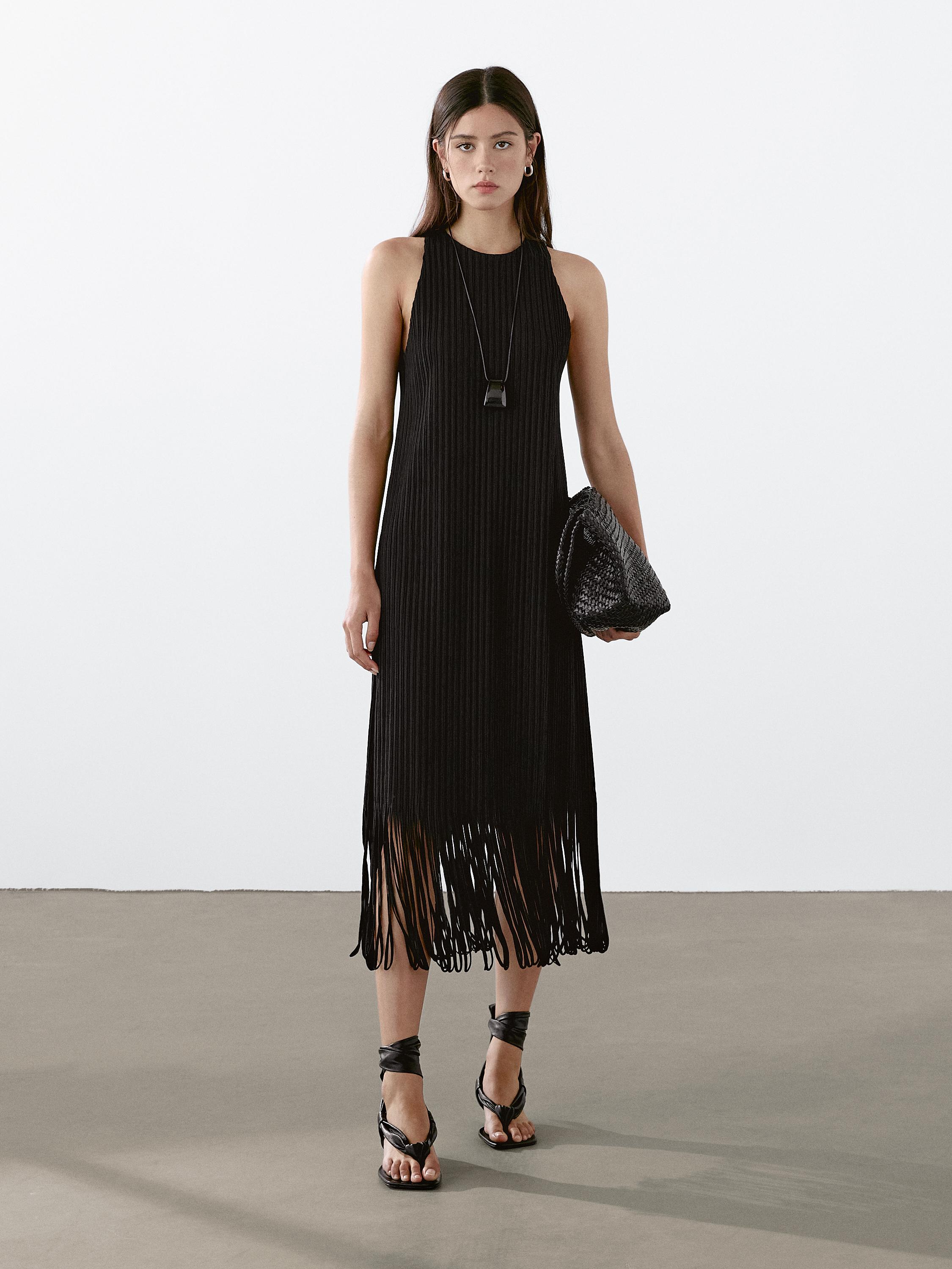 Textured knit dress with fringed hem