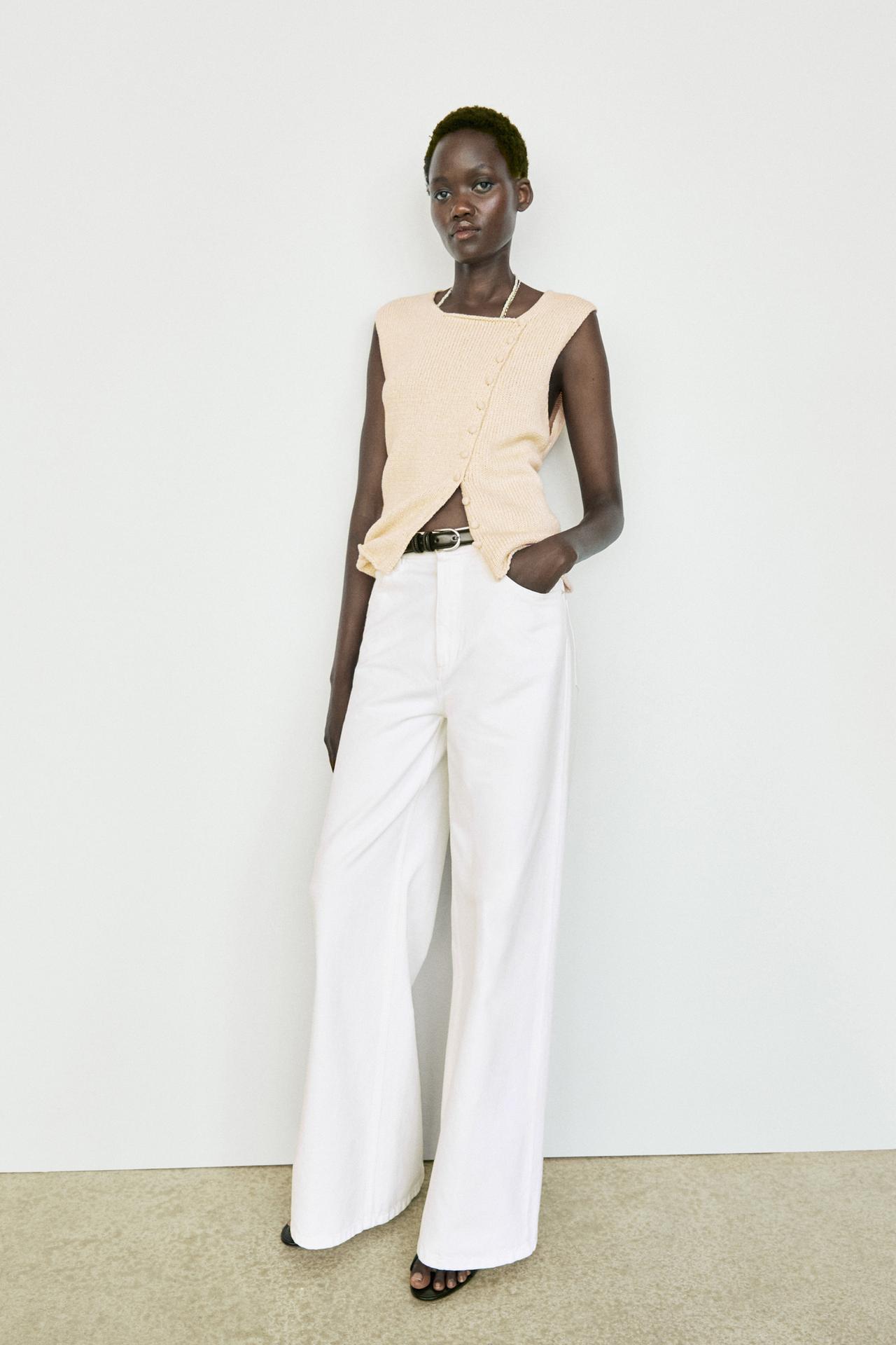 Cotton blend knit top with button detail — CREAM