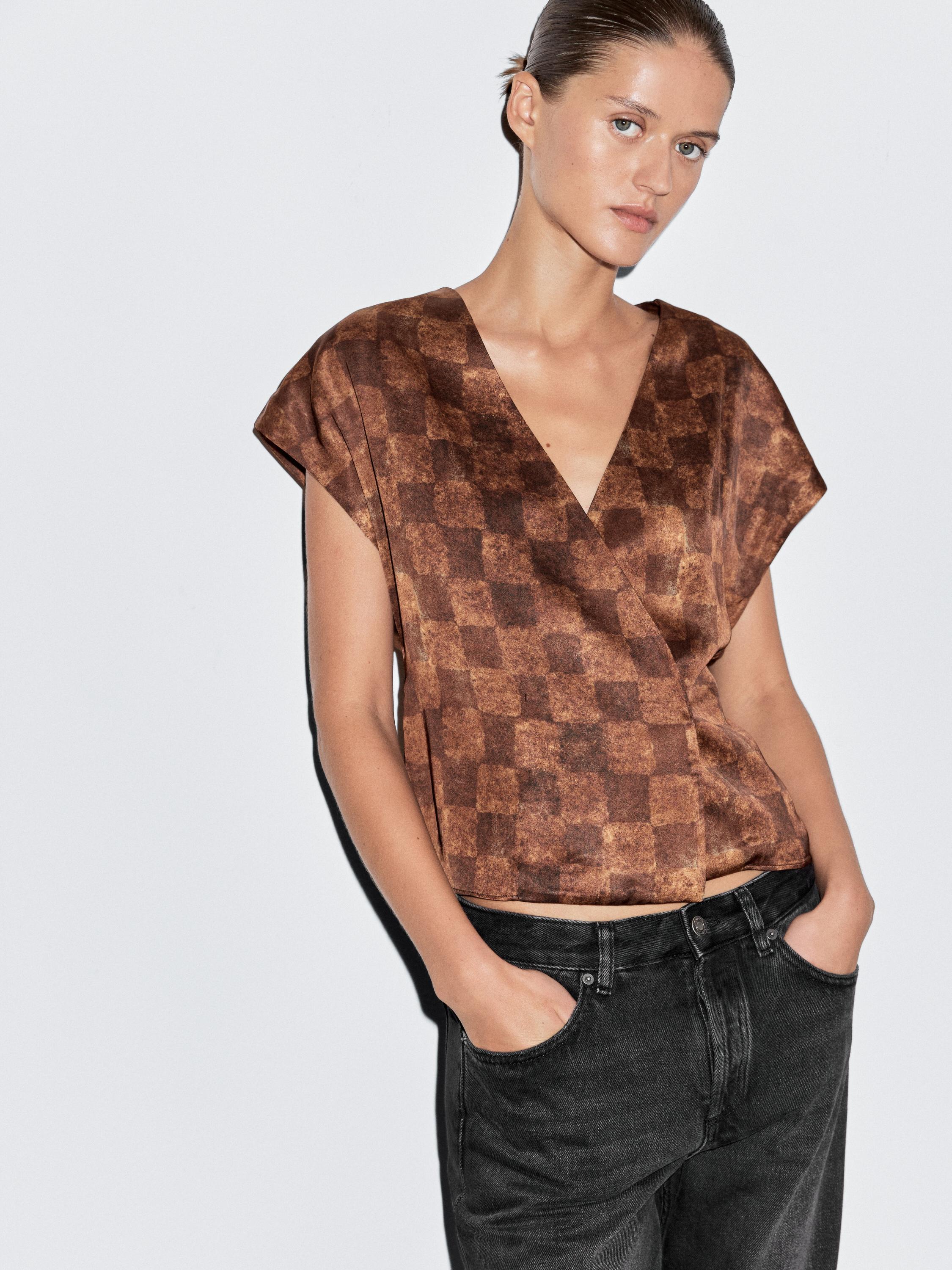 Top encreuat efecte setinat