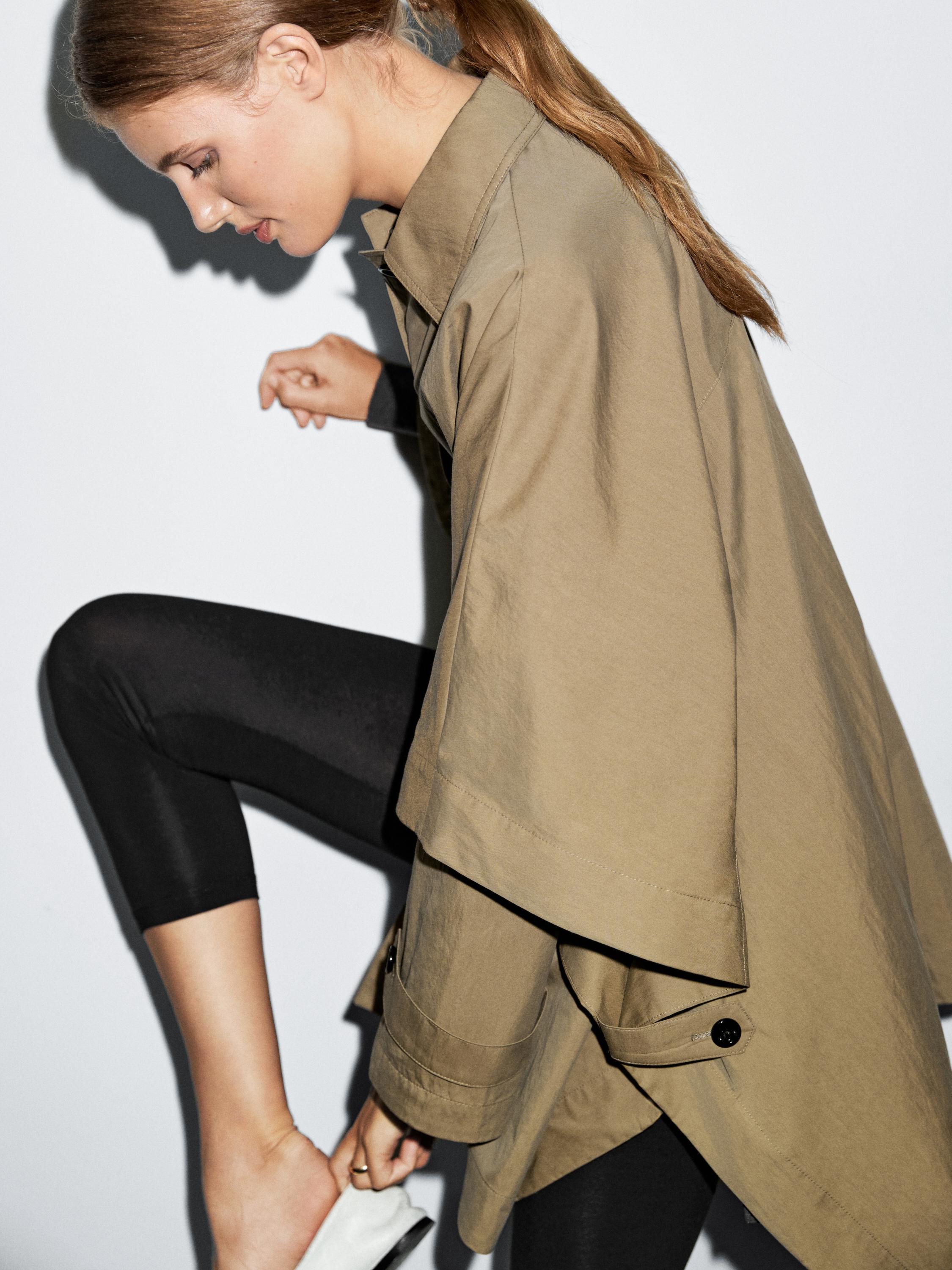 Cape trench coat with long sleeves