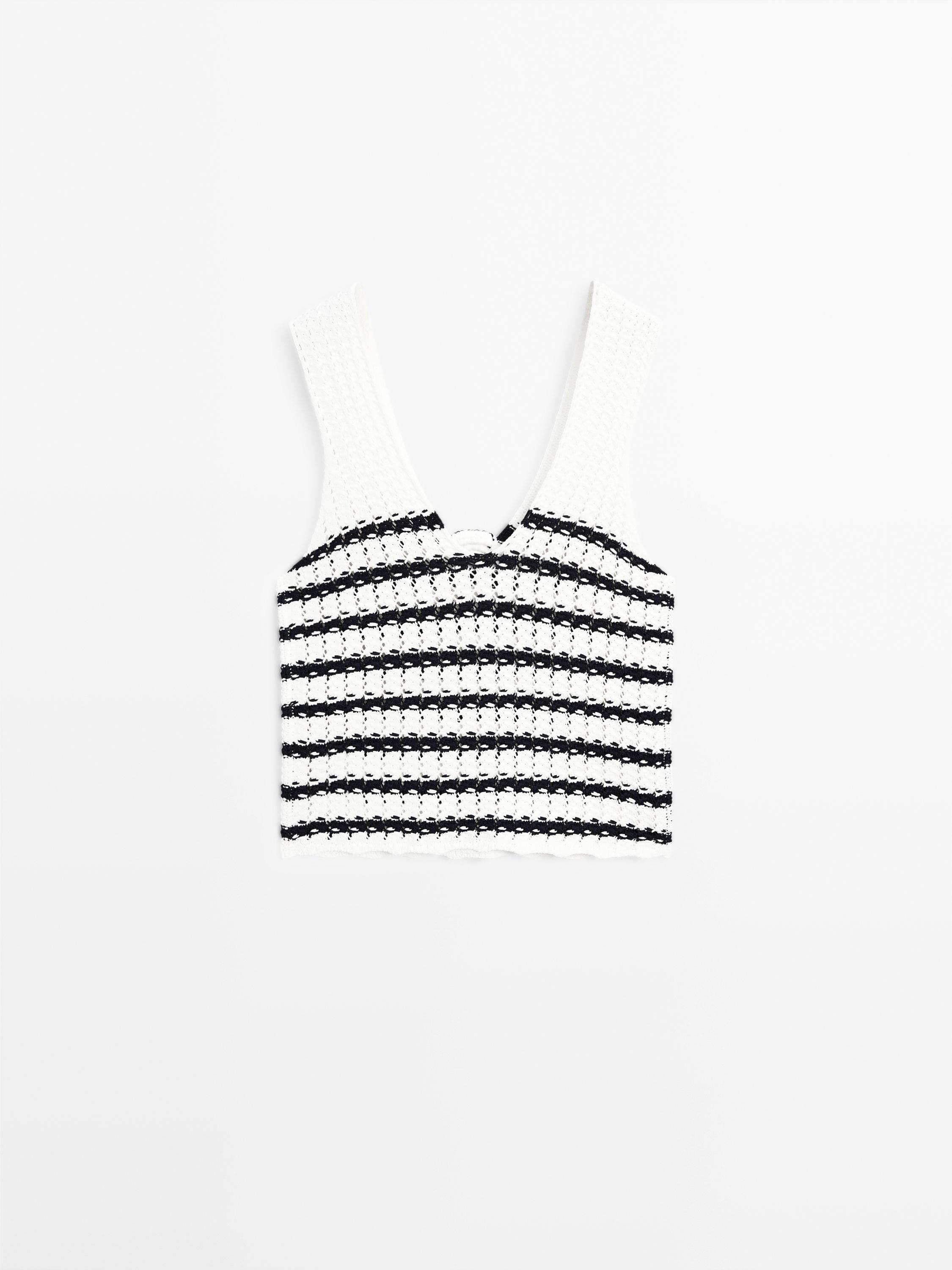 Knit top with floral detail