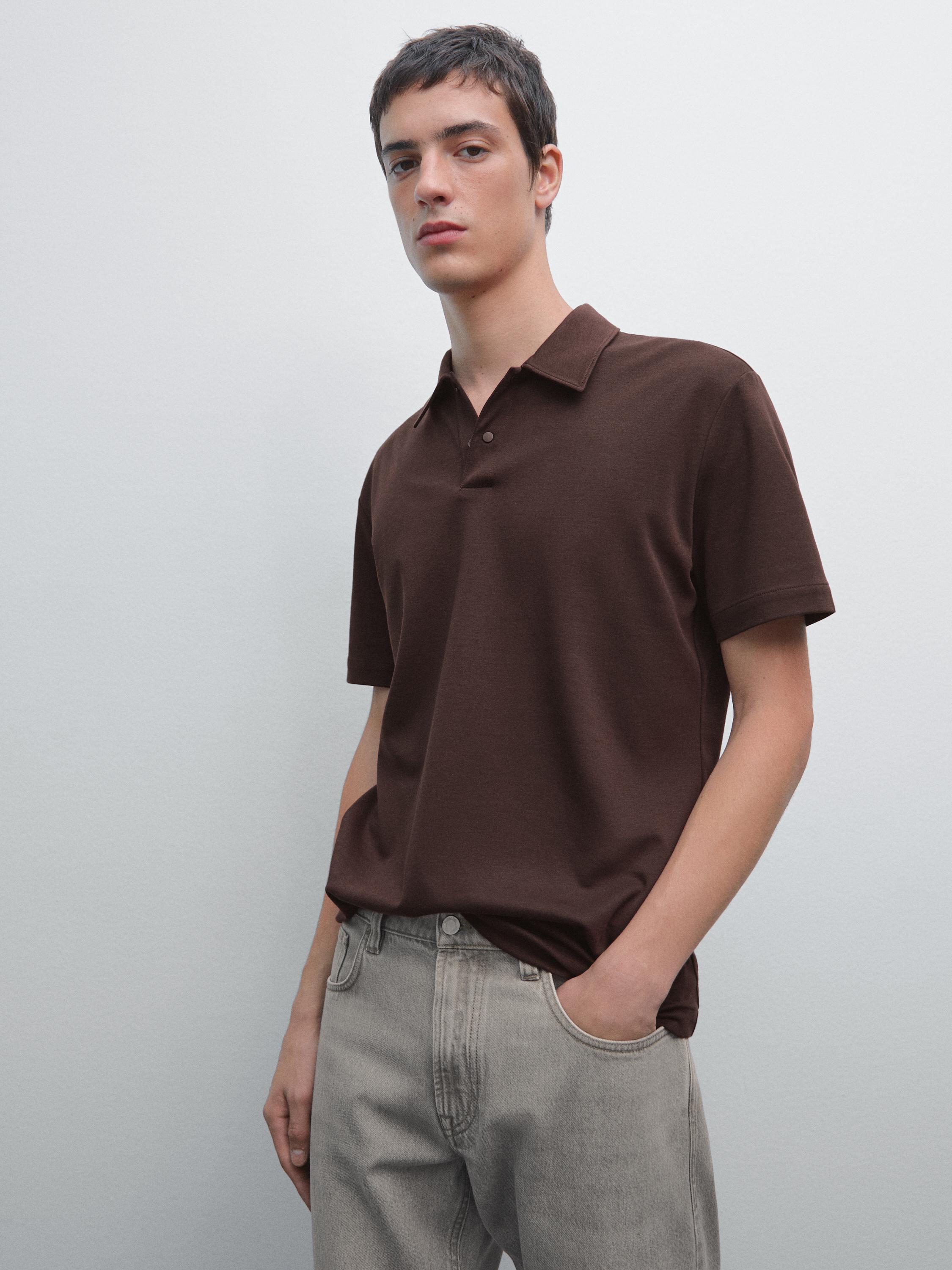 Polo à manches courtes et patte pressionnée