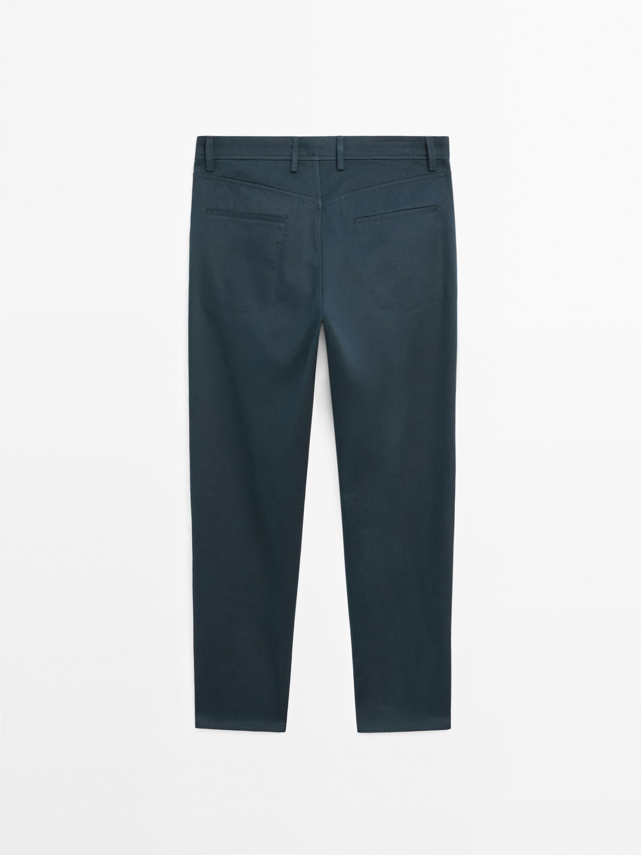Cotton blend tapered fit denim trousers