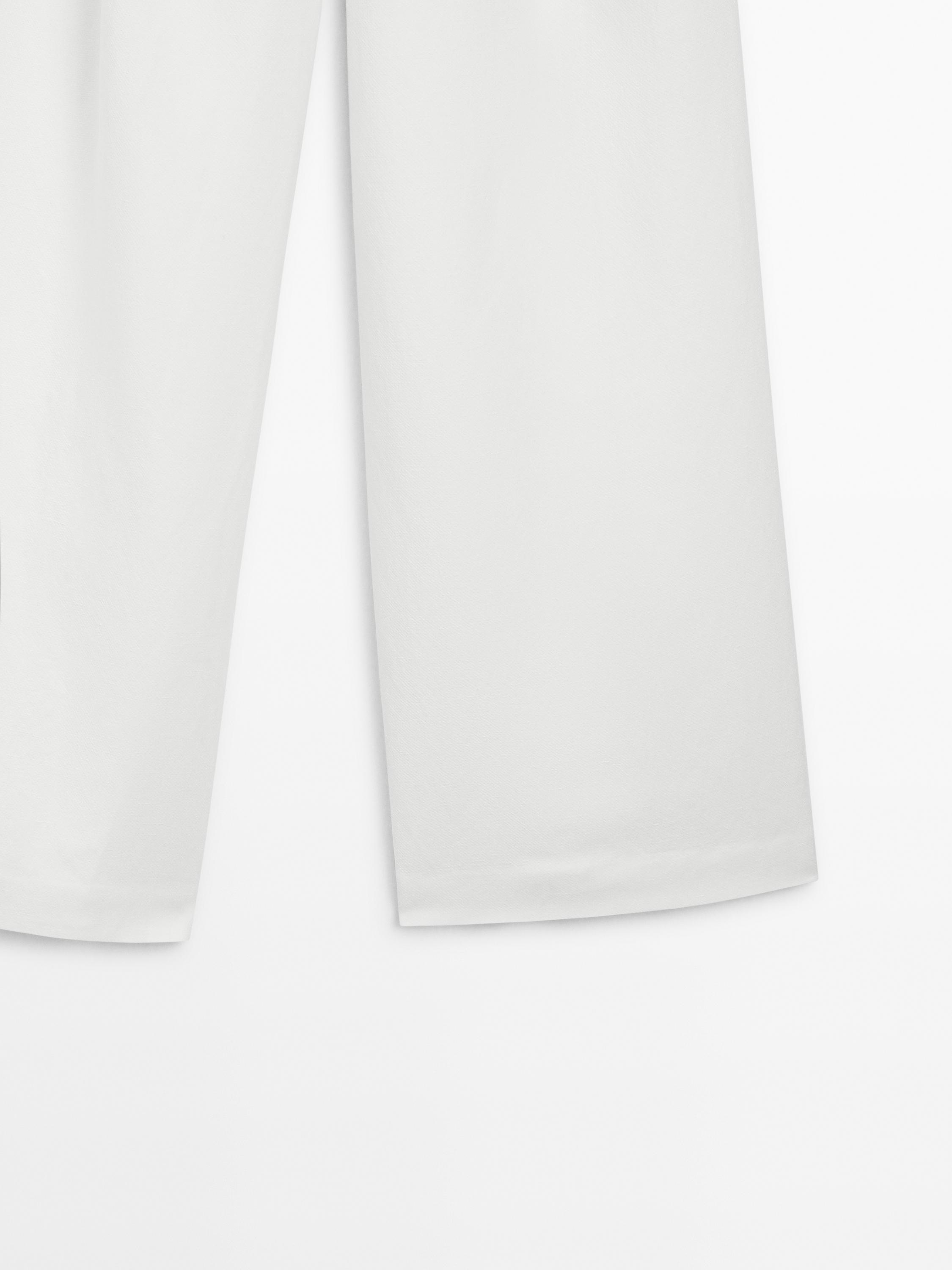 Flowing pleated palazzo trousers