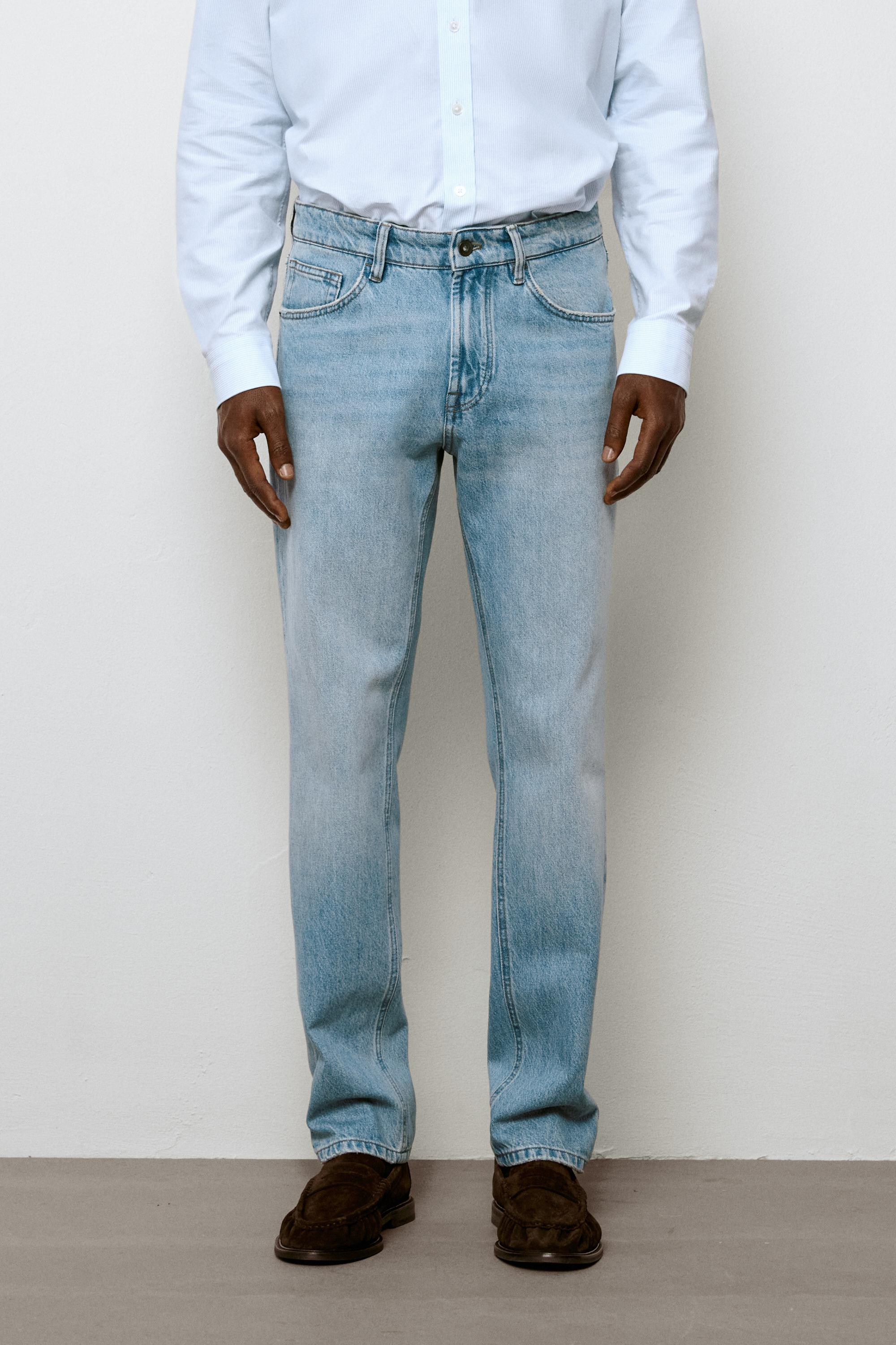 Bleach washed tapered fit jeans