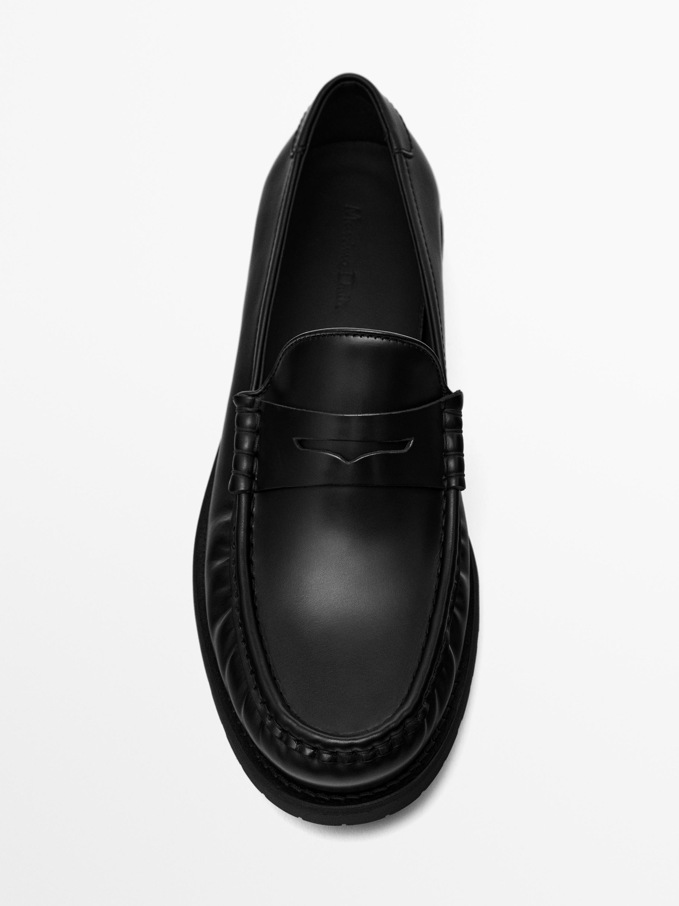 Black leather loafers