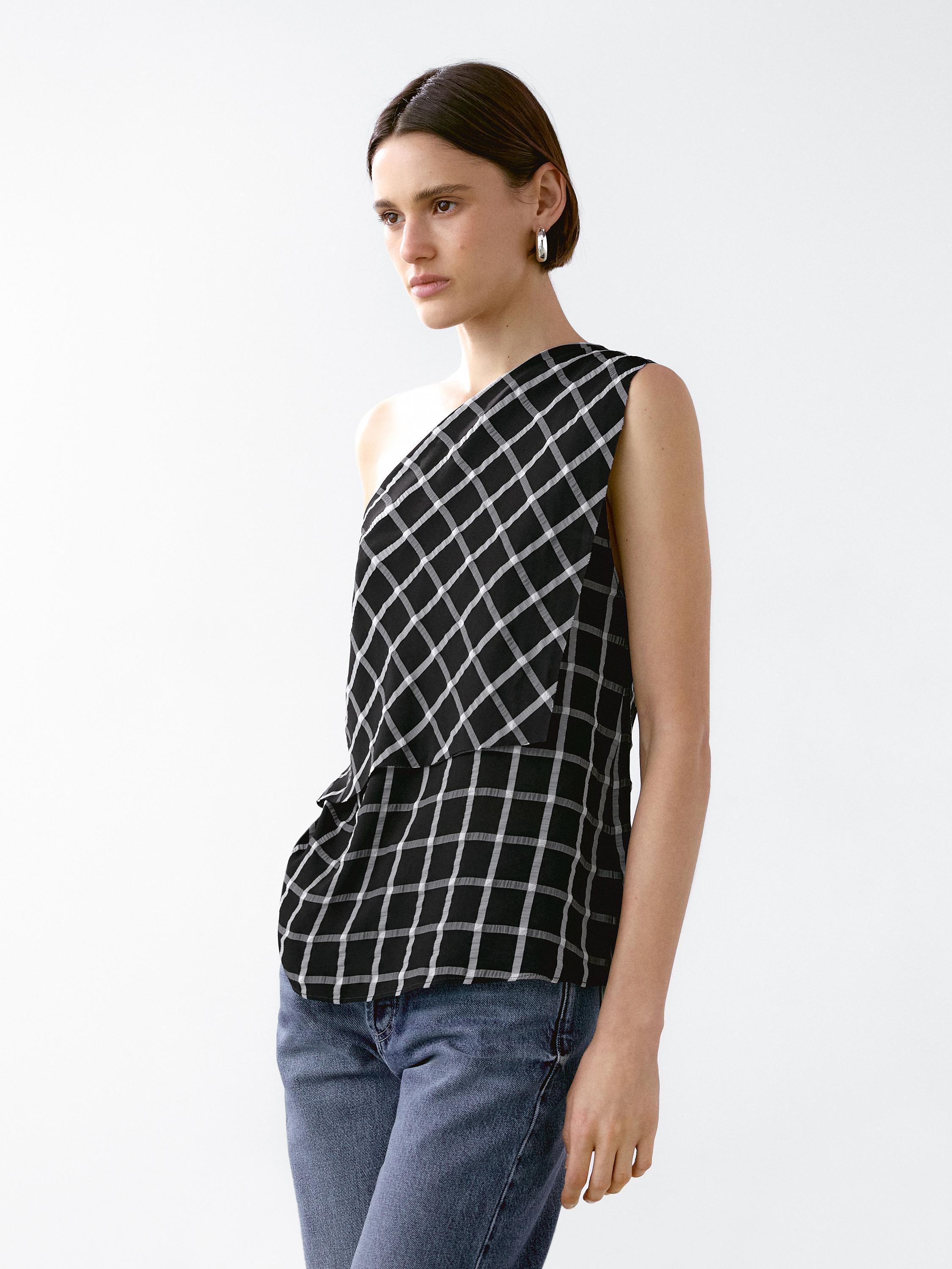 Checked top with asymmetric neckline