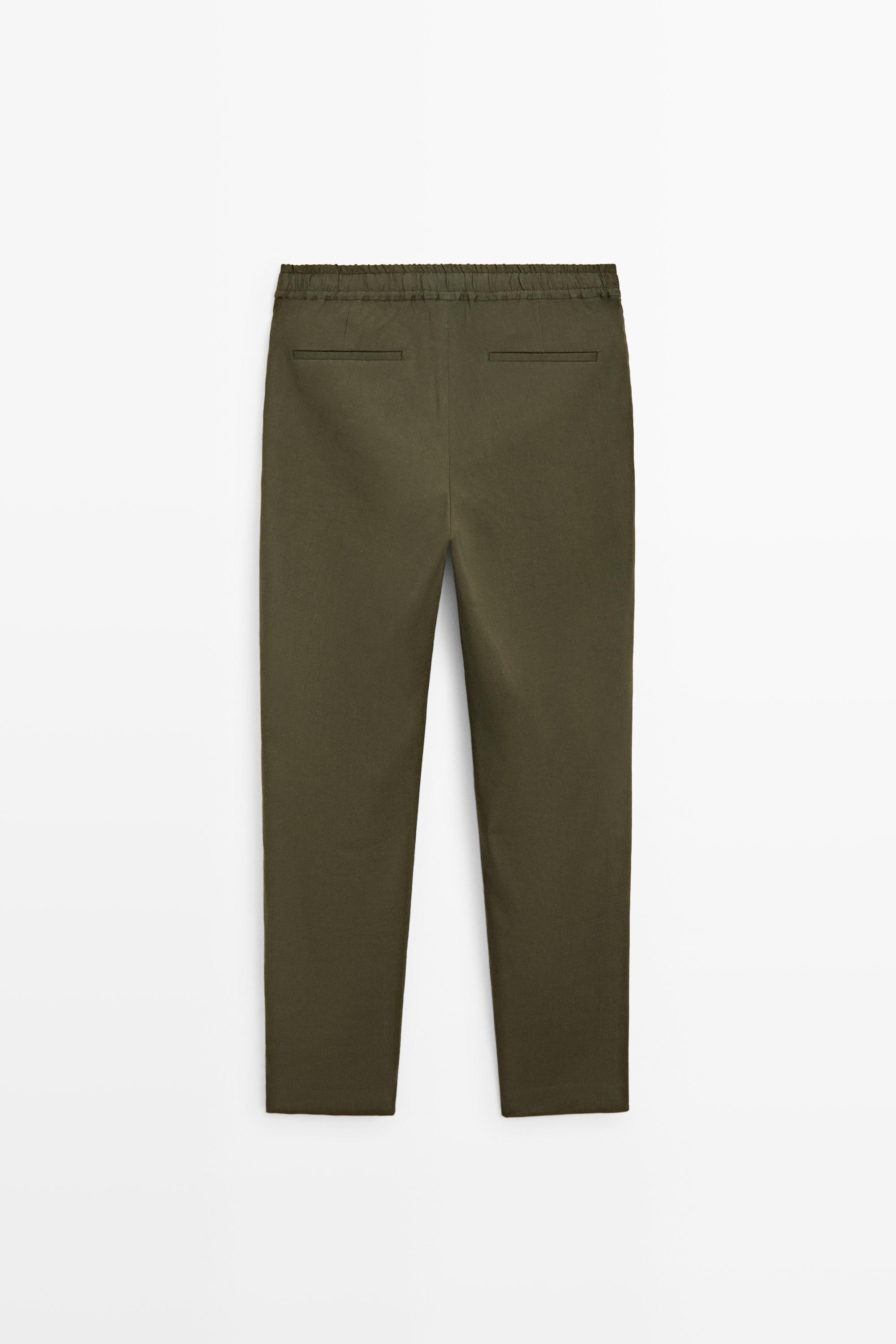 Total look darted jogger fit trousers — GREEN