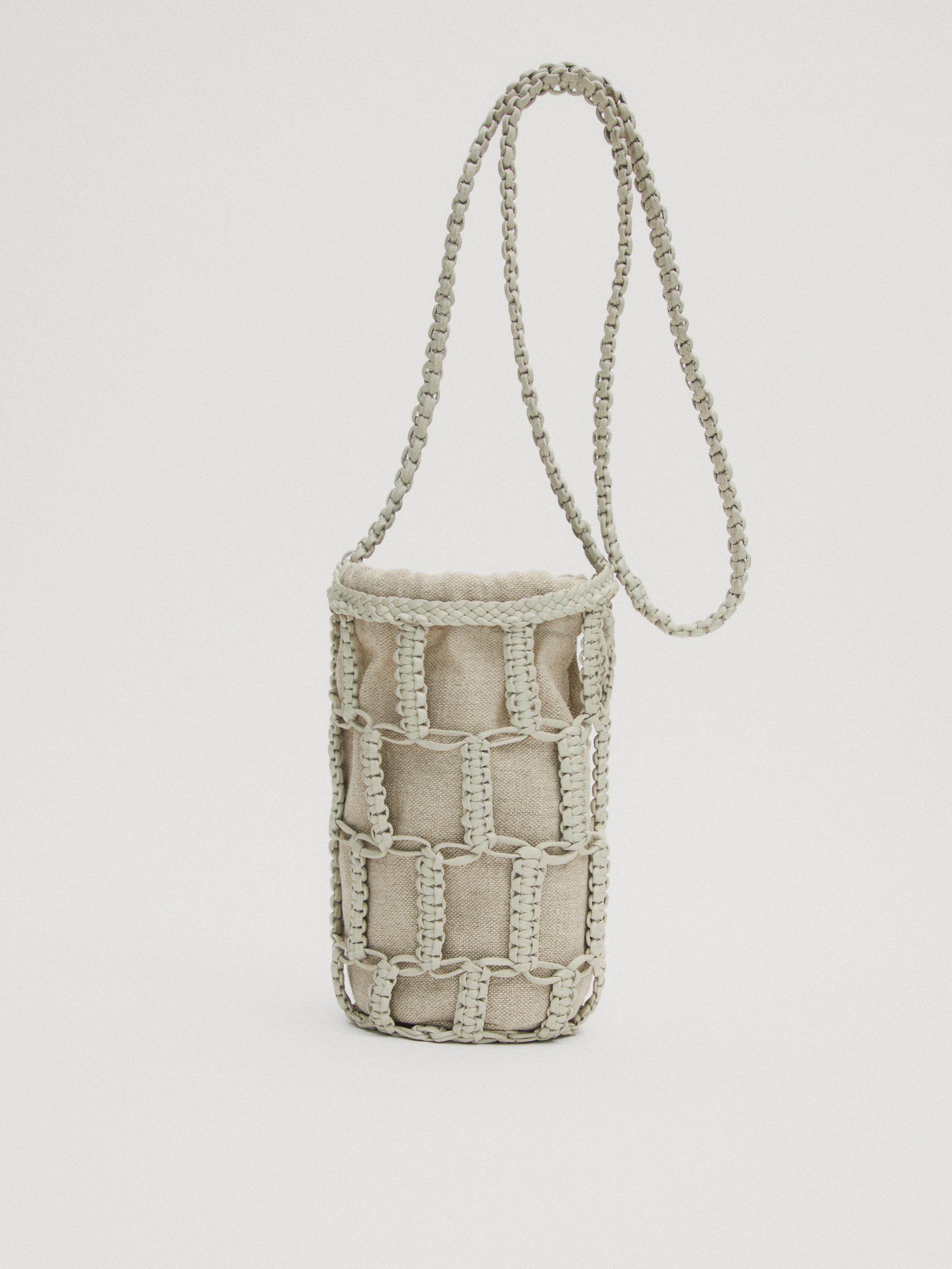 Mini-sac seau tressé en cuir nappa