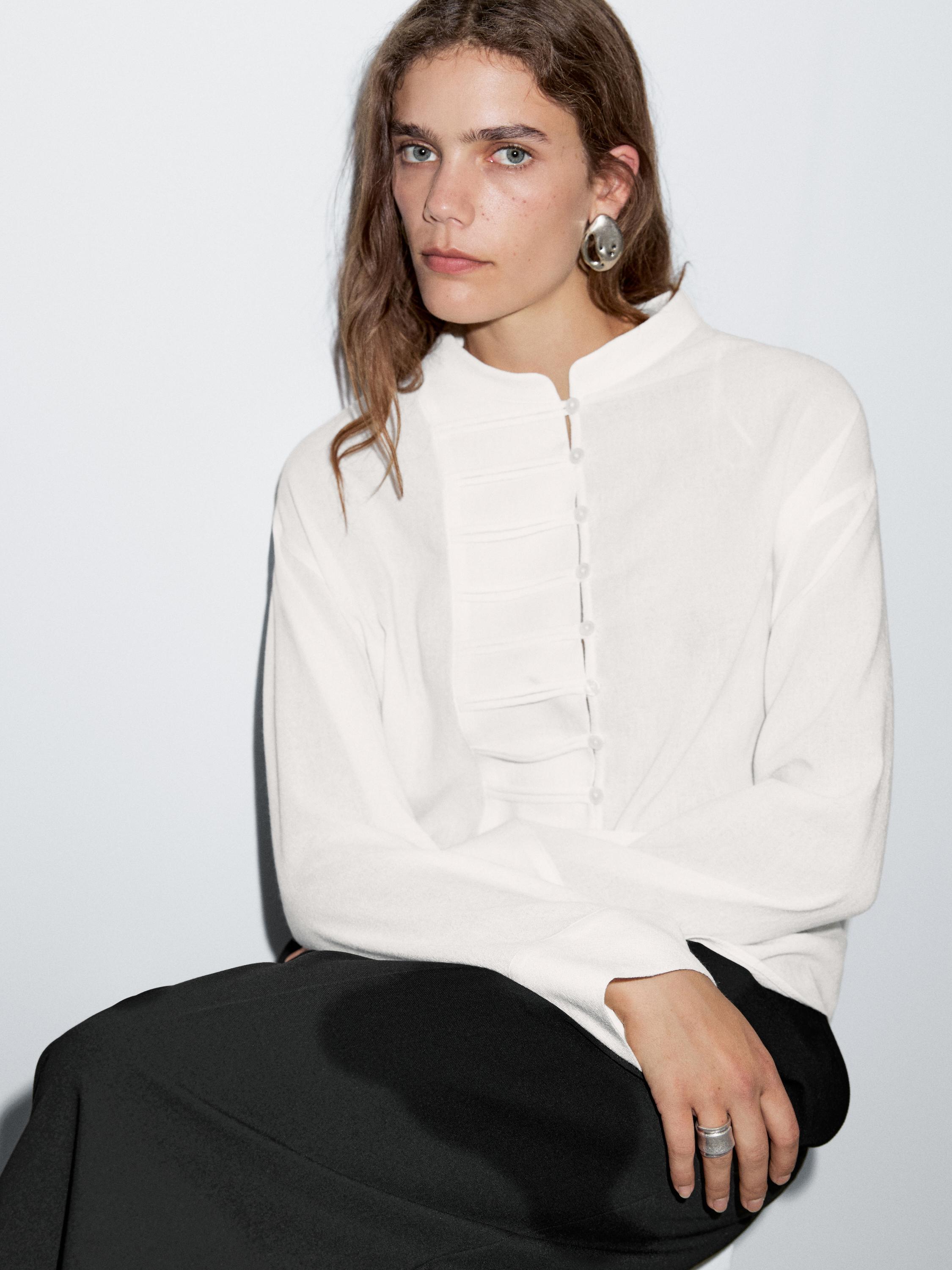 Top met ronde hals en naaddetails