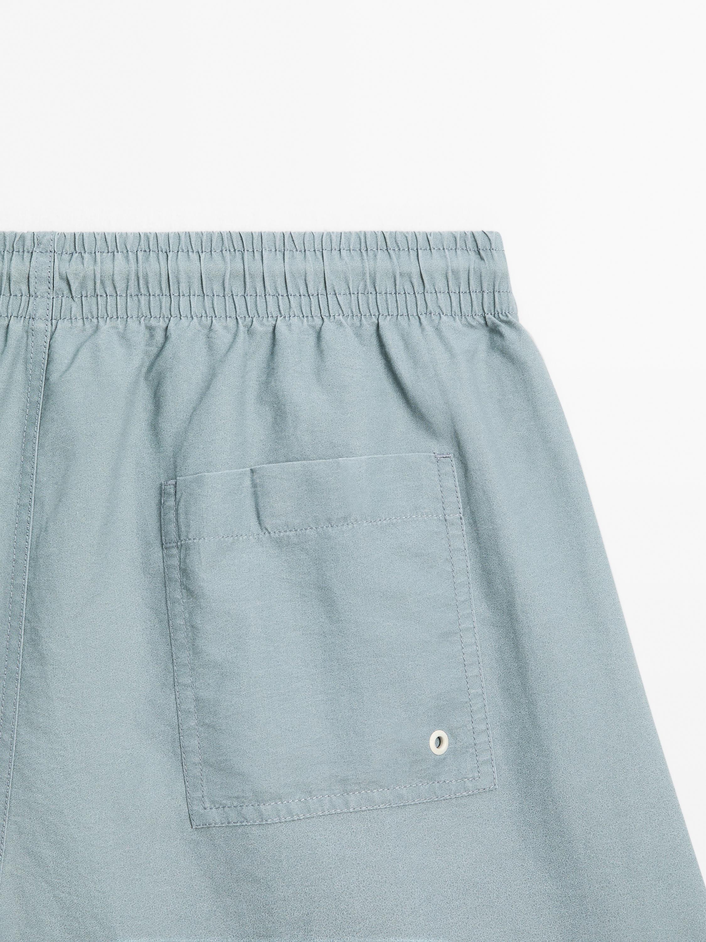 Plain regular fit swimming trunks