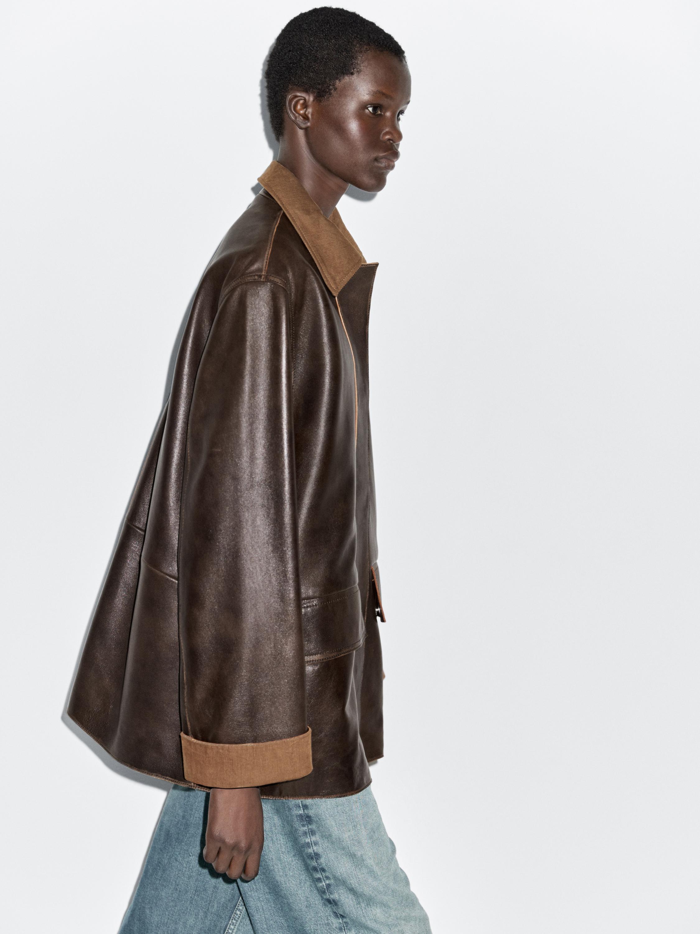 Parka detalle pana piel napa