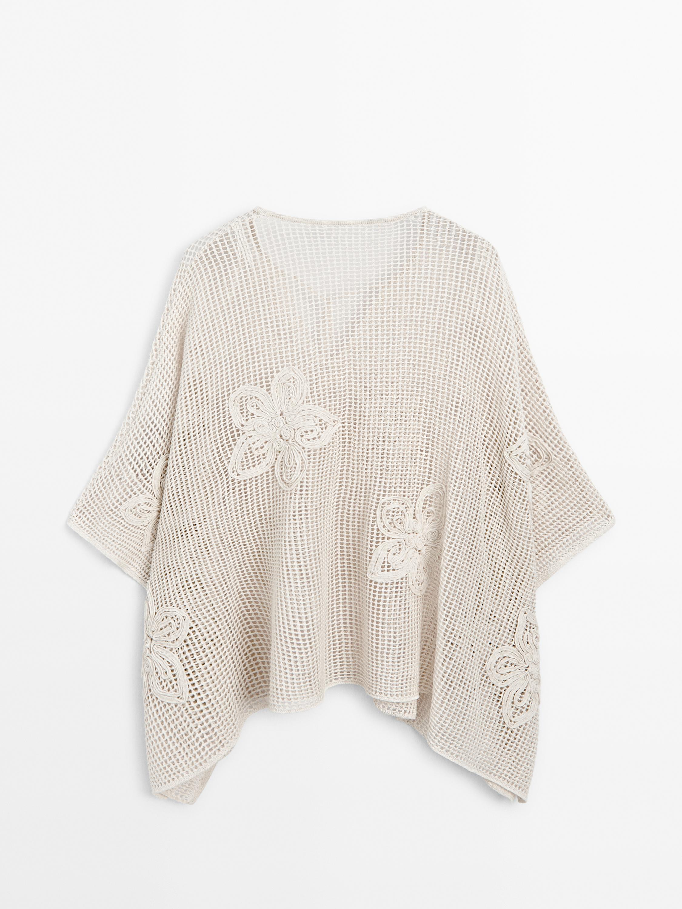 Embroidered cutwork cape