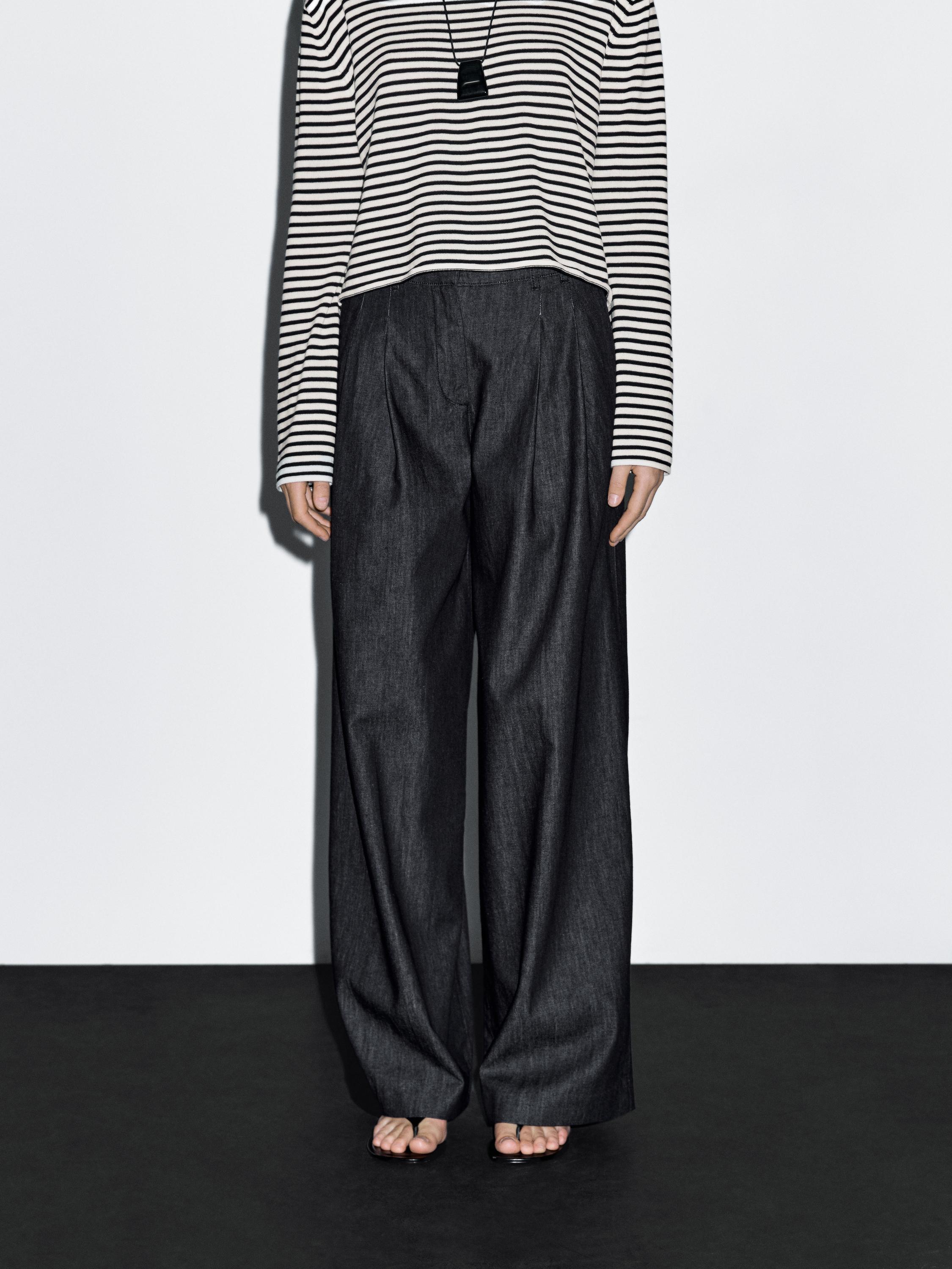 Lekkie jeansy z szerokimi nogawkami i wysokim stanem