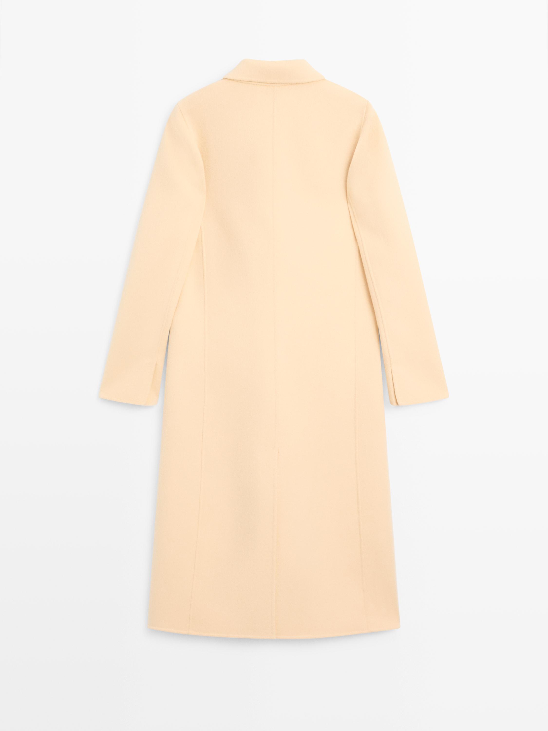 Ilgas maišytos vilnos paltas susiausta iškirpte