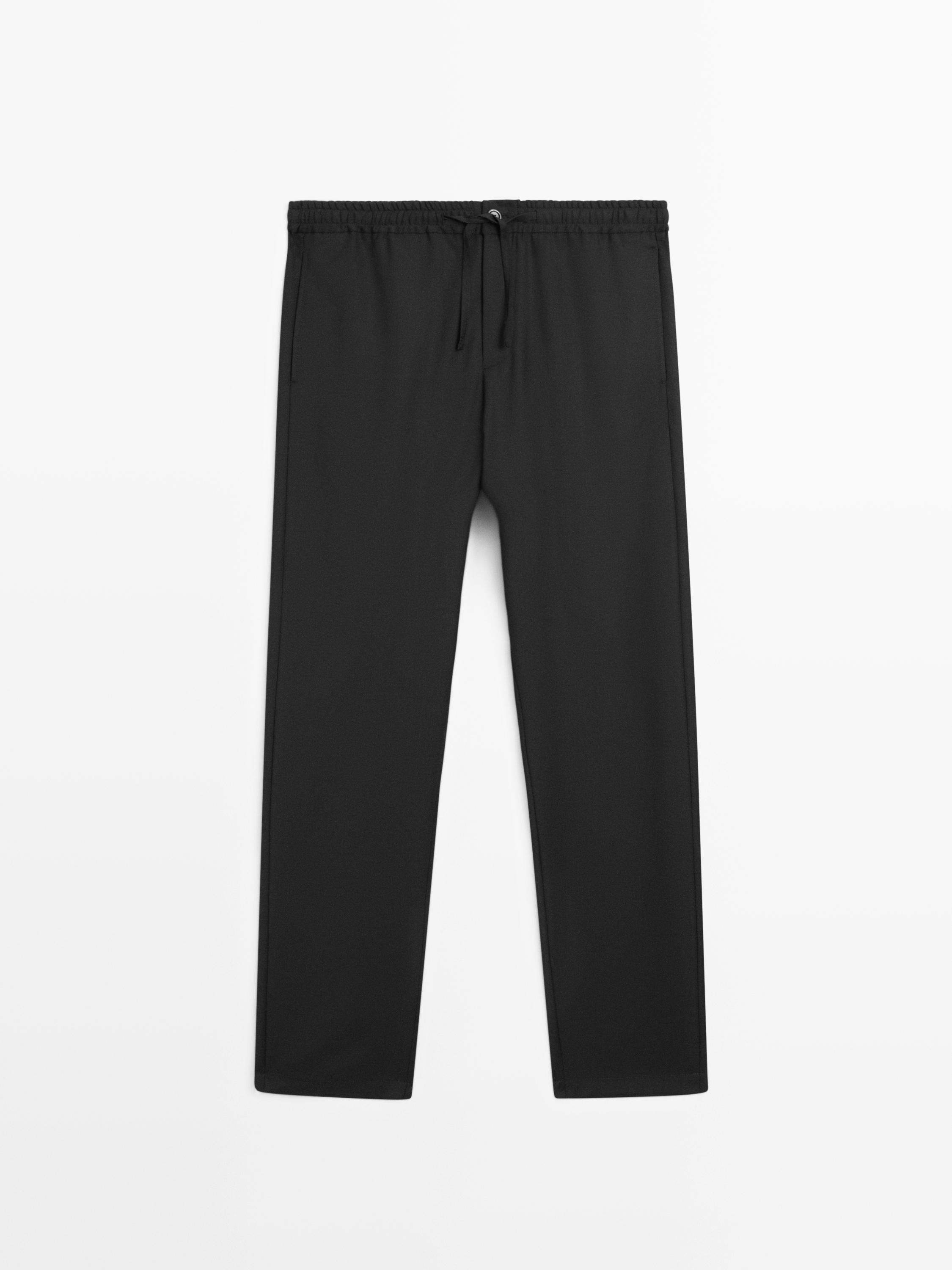 Relaxed fit 100% wool trousers — BLACK