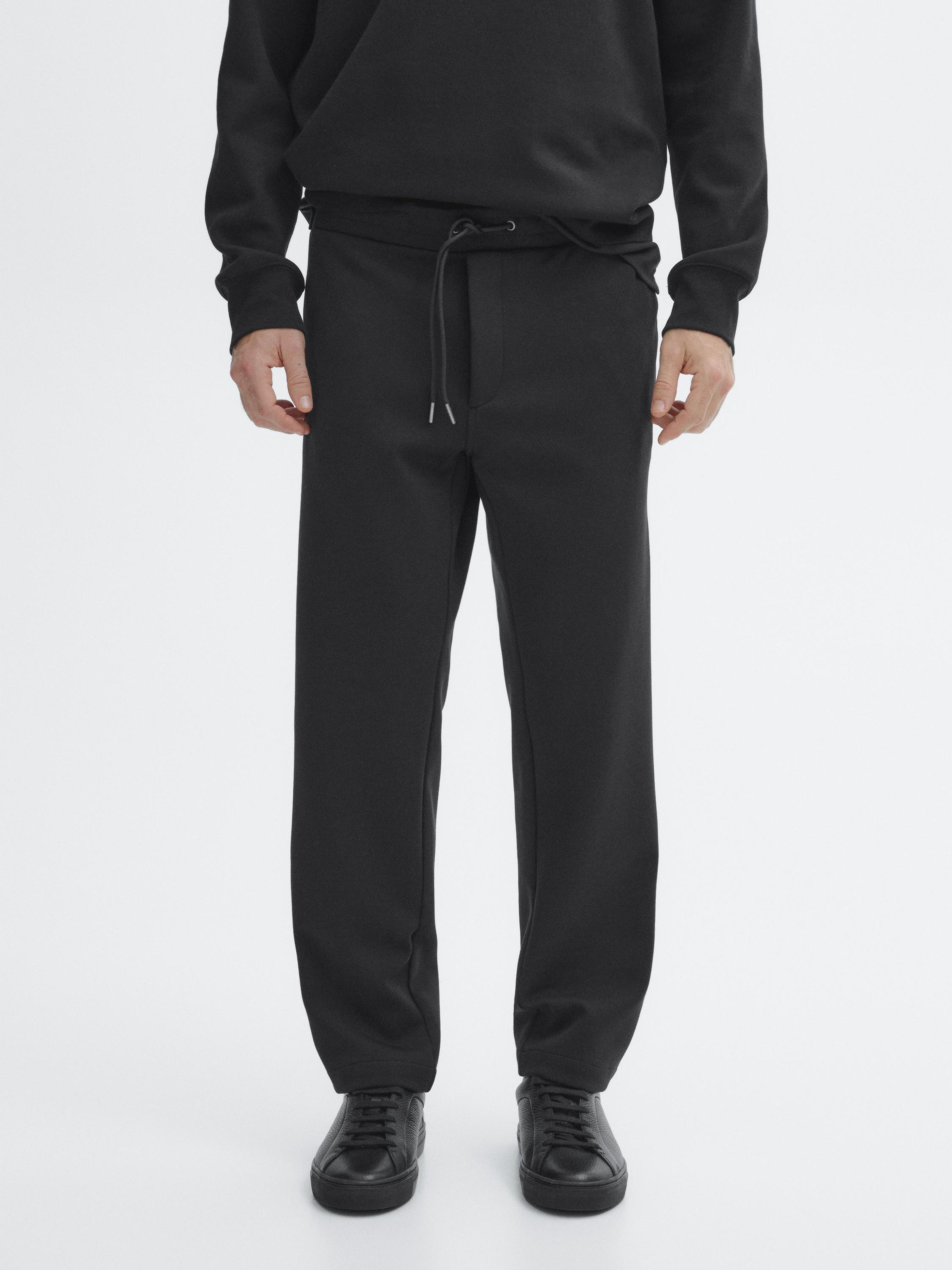 Trousers with side pocket detail