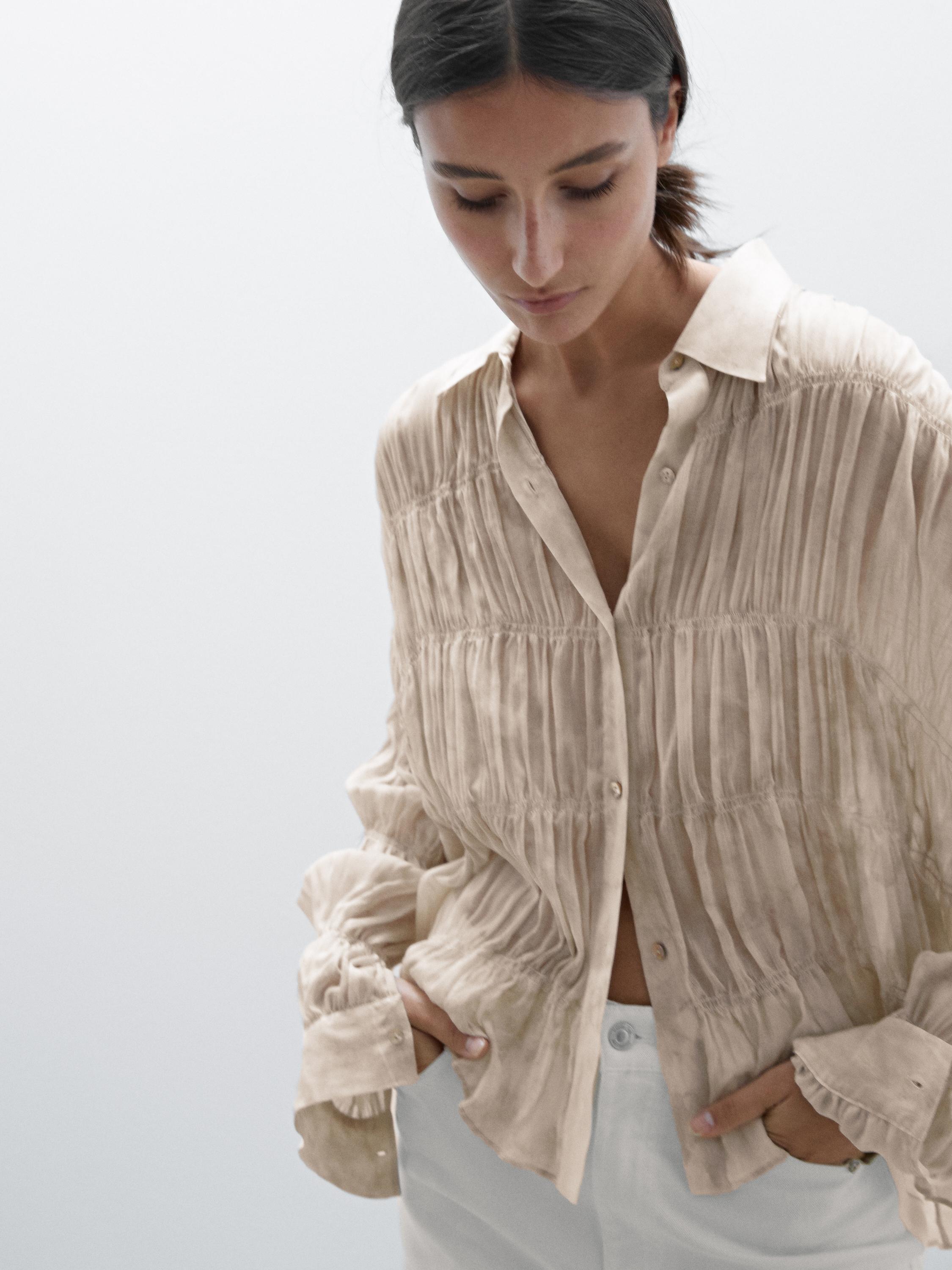 Flowing shirt with gathered details