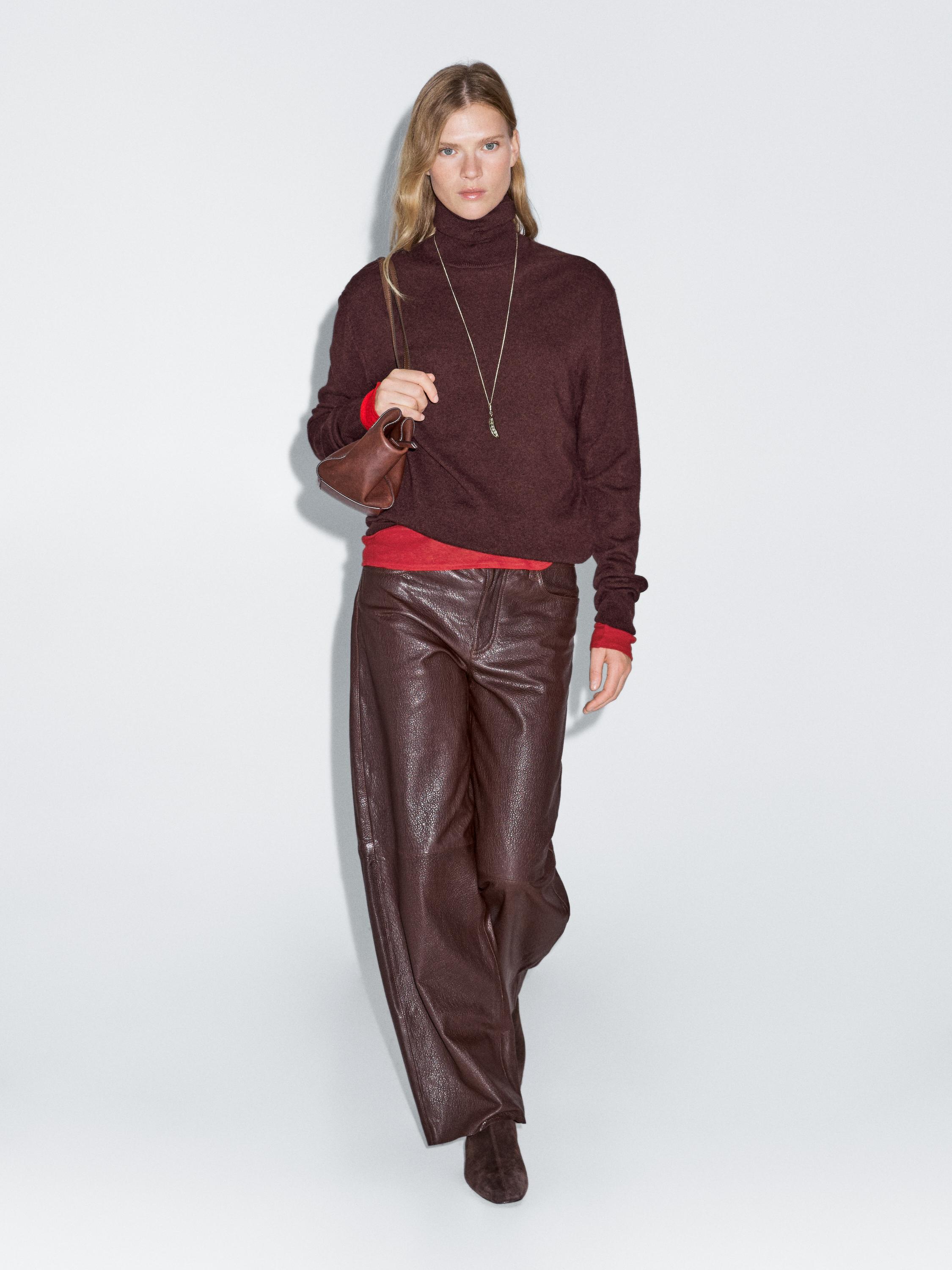 Wool blend knit sweater with high neck