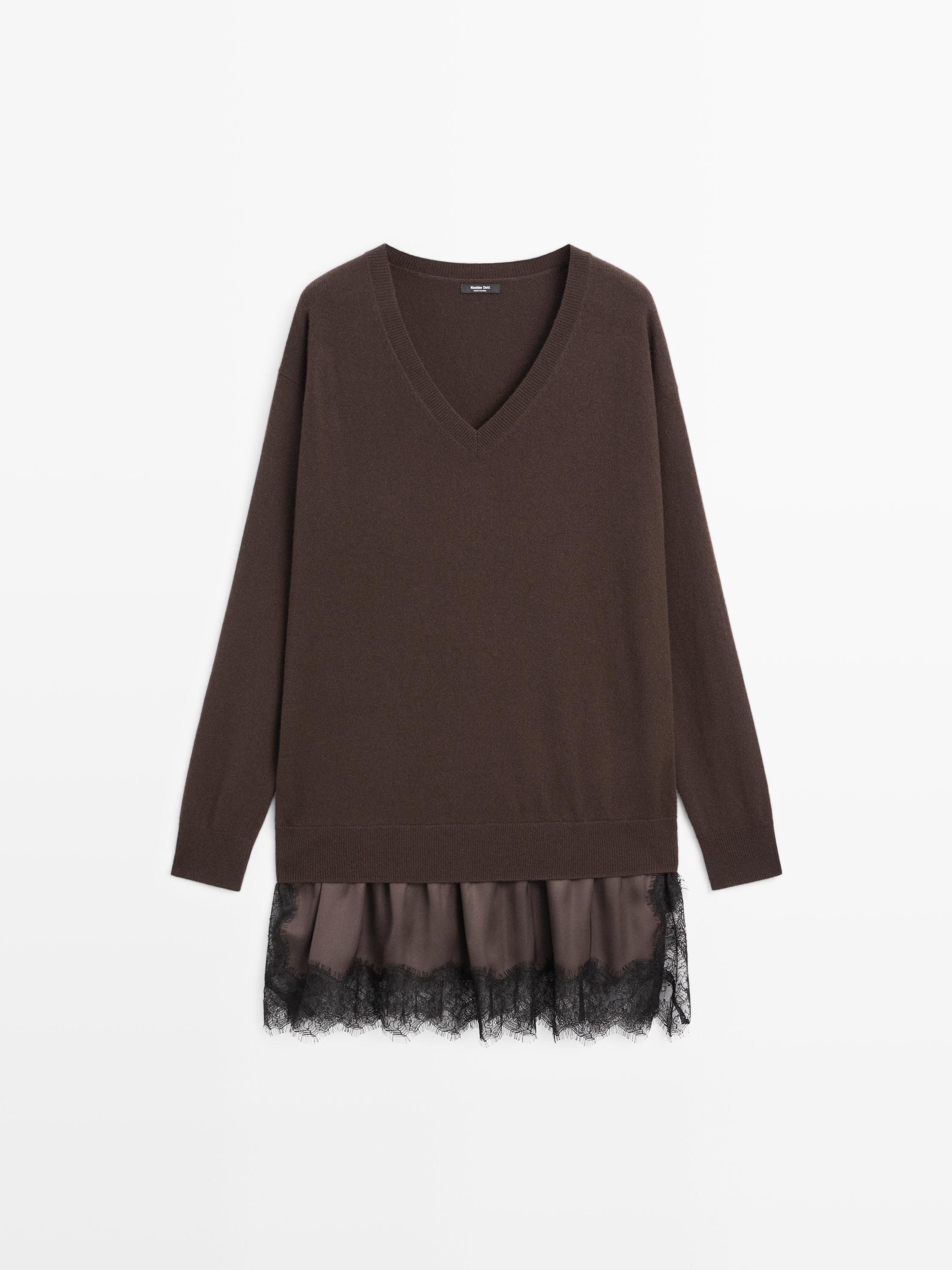 Lång stickad tröja med kontrastspets