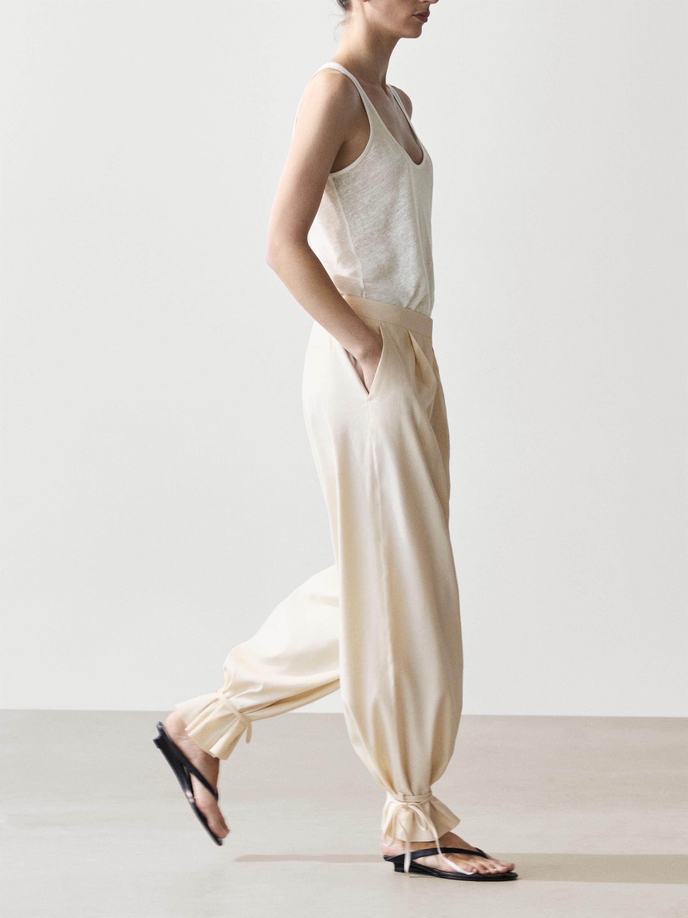 Flowing barrel fit trousers — CREAM
