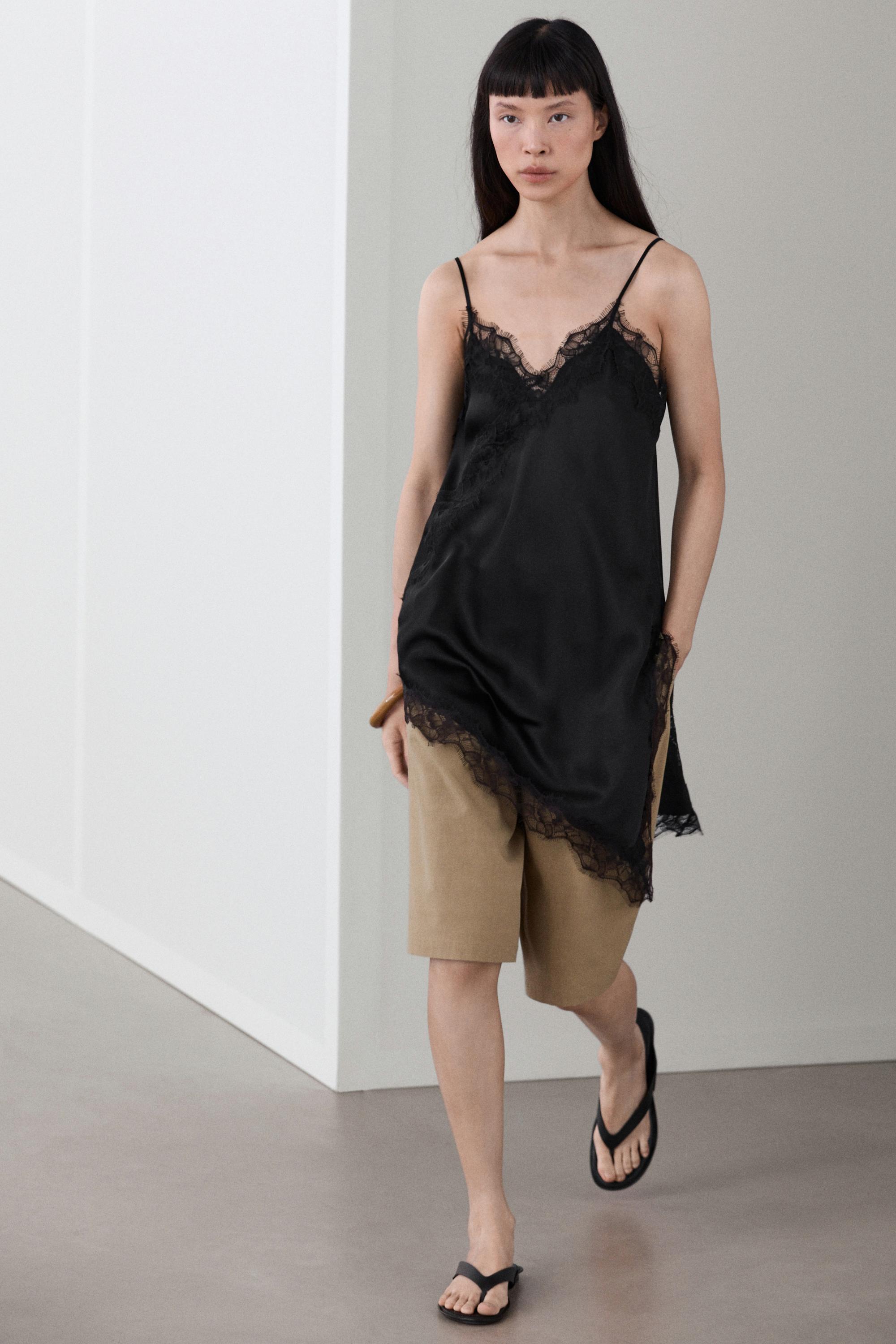 Asymmetric thin strap camisole top — BLACK