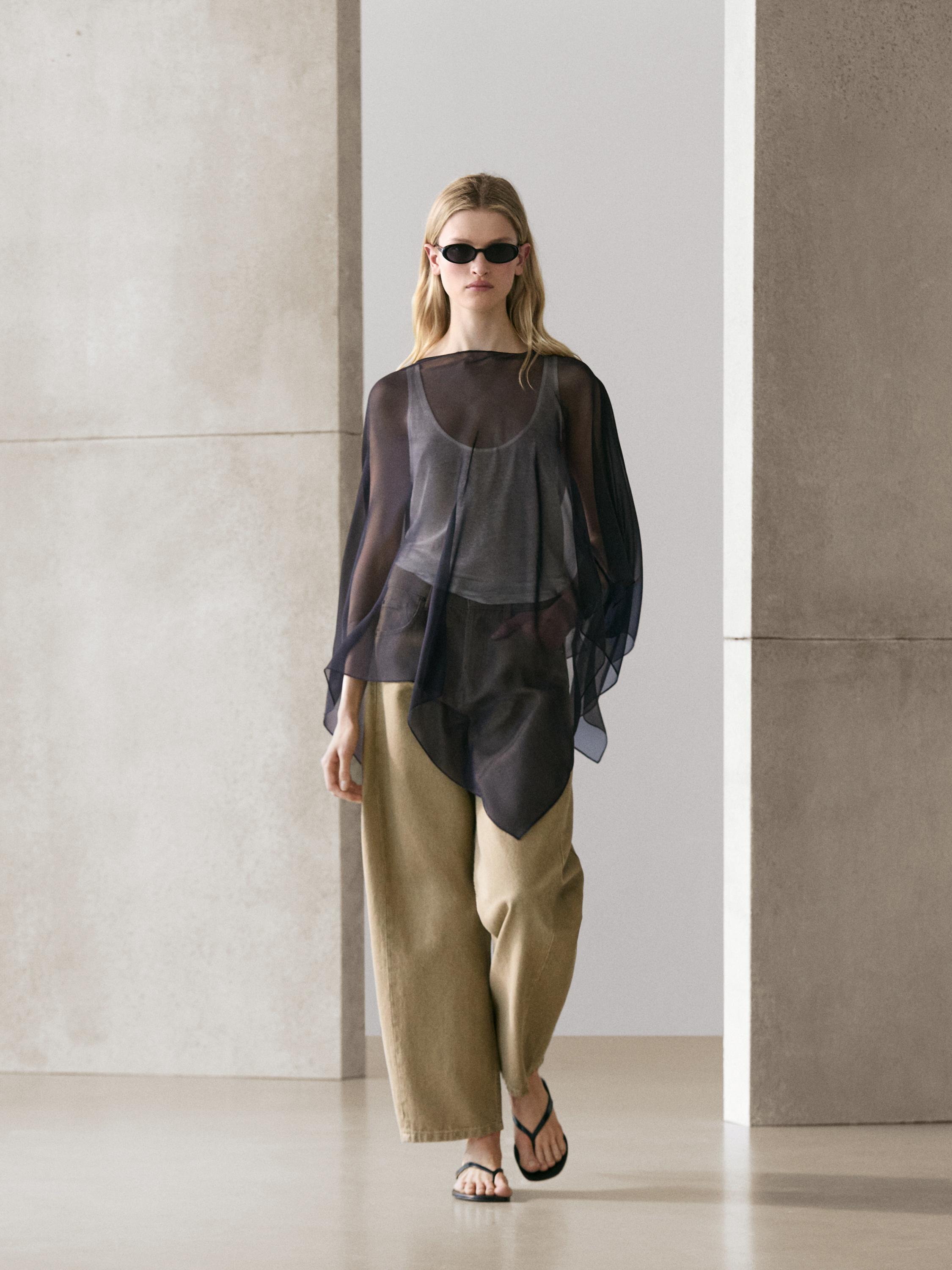 Asymmetric cut silk cape