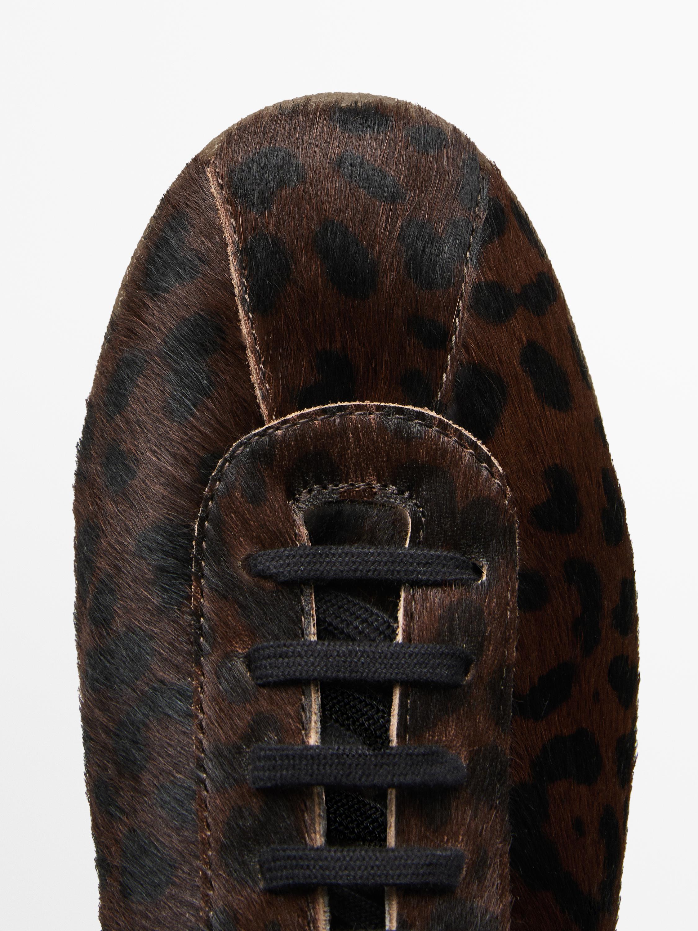 Animal print faux fur trainers