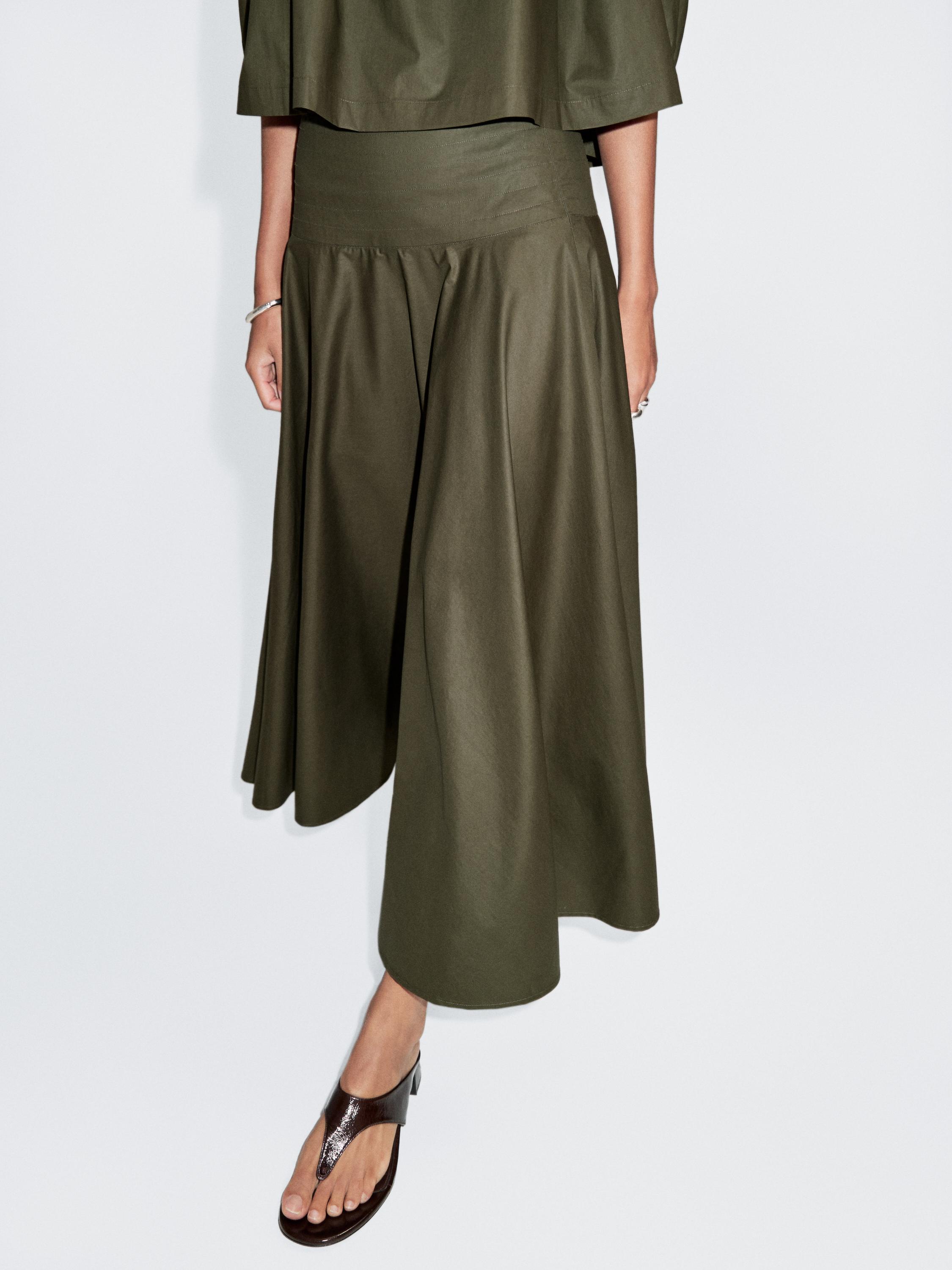 Flared midi skirt with sash belt