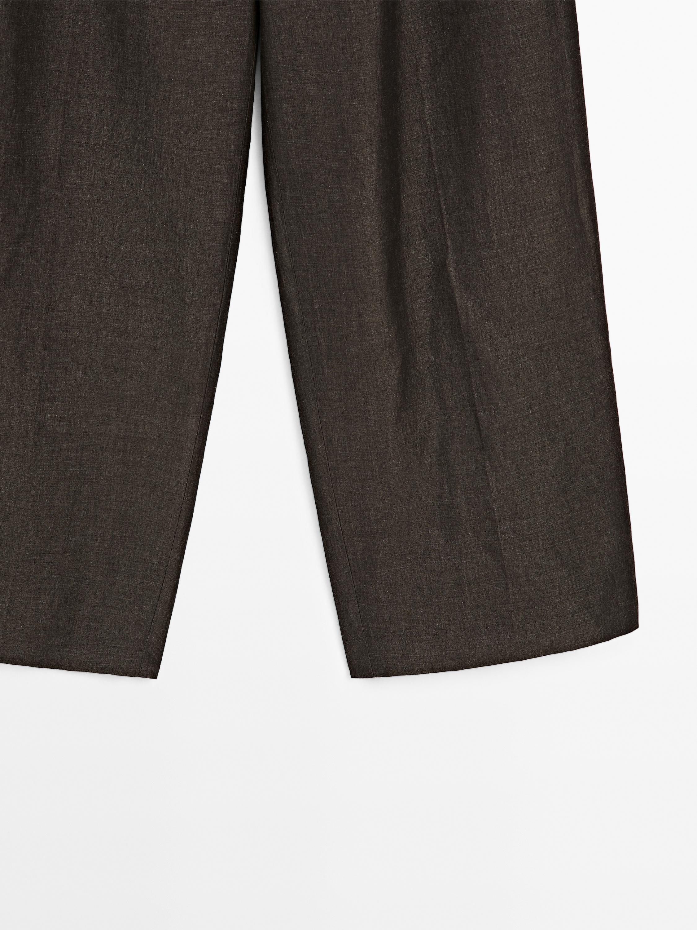 Flowing linen blend trousers with pleats