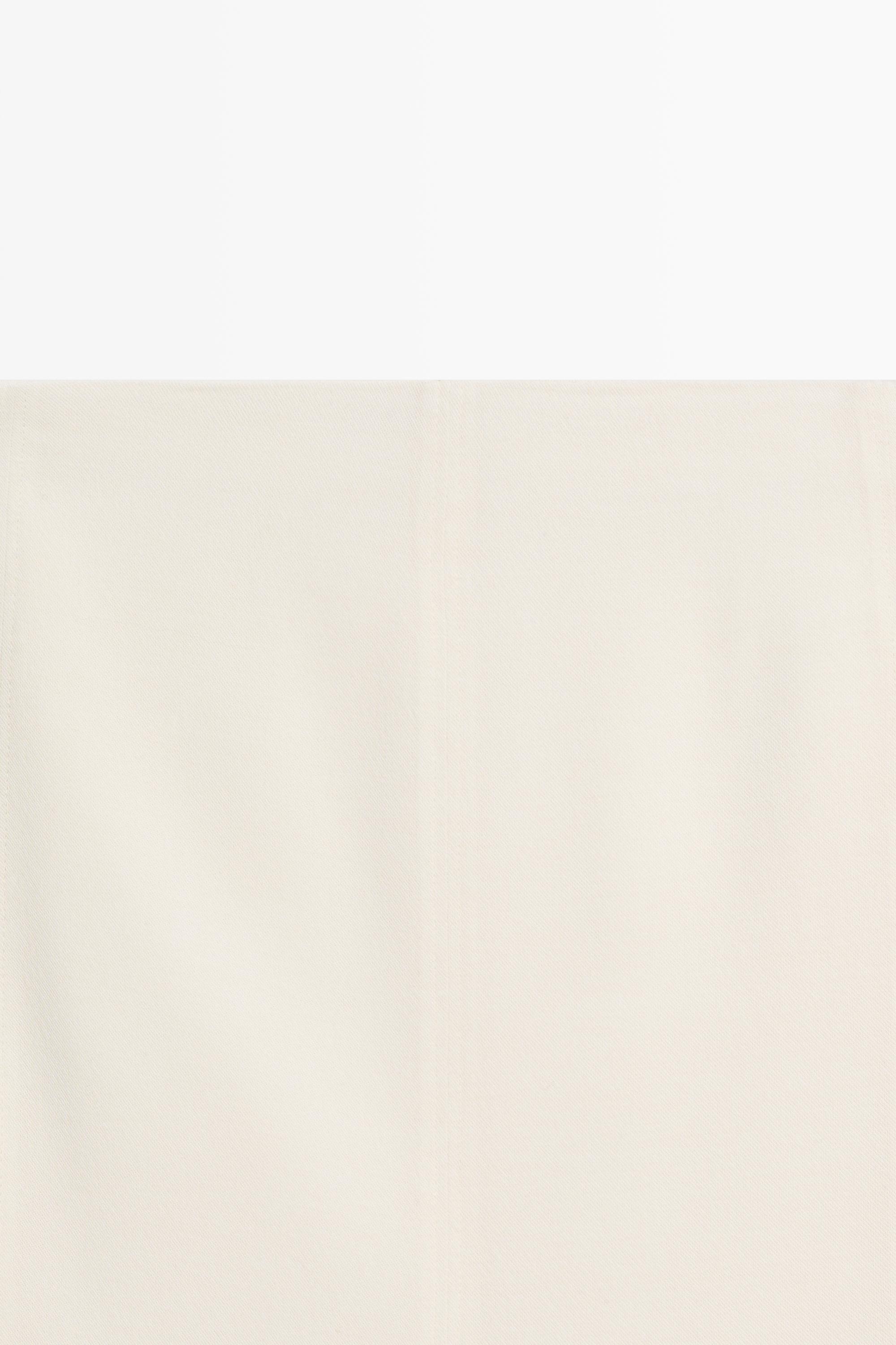 Double-layered midi skirt with seam detail — Off white