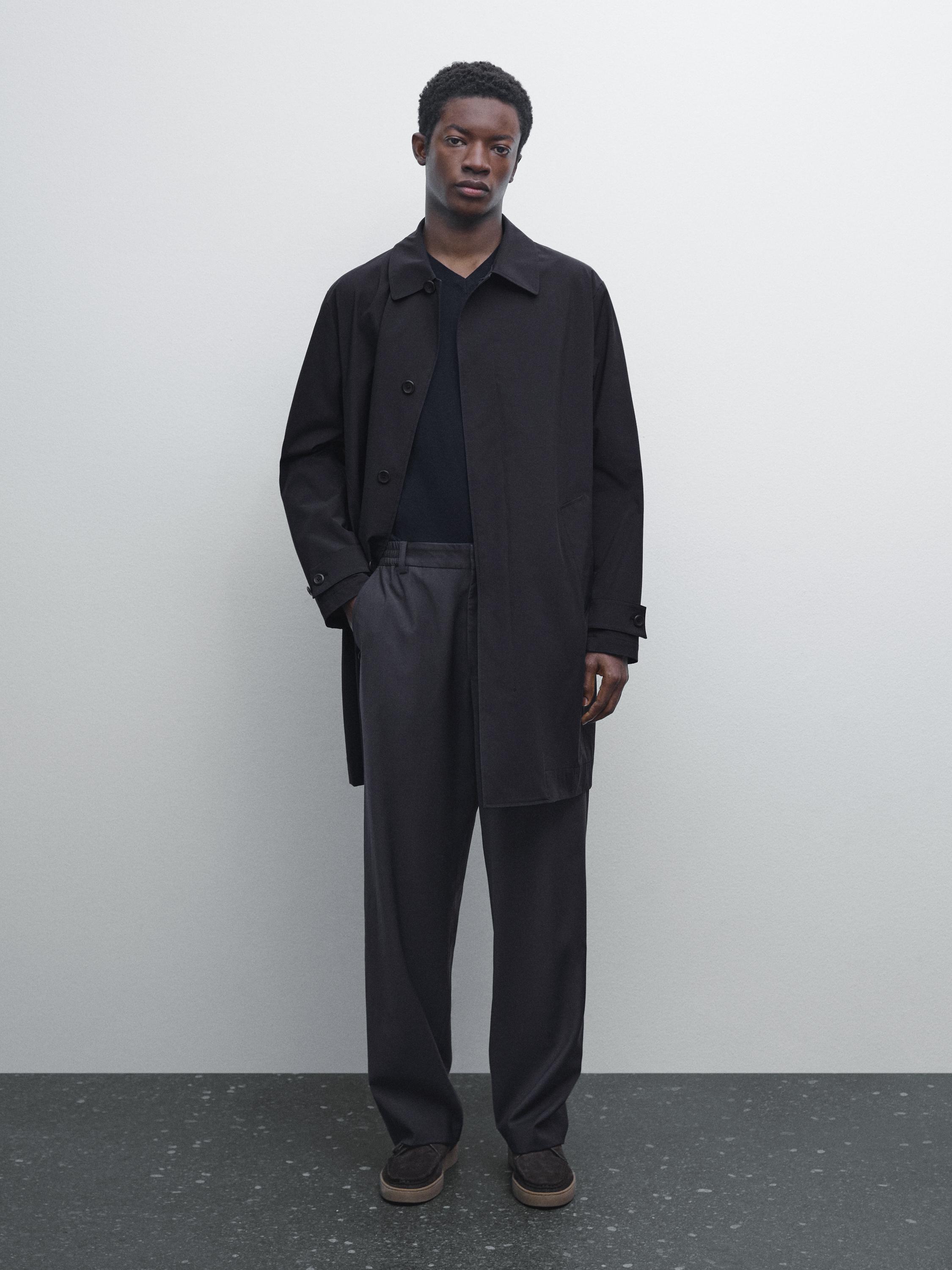 Lightweight trench coat with hidden buttons