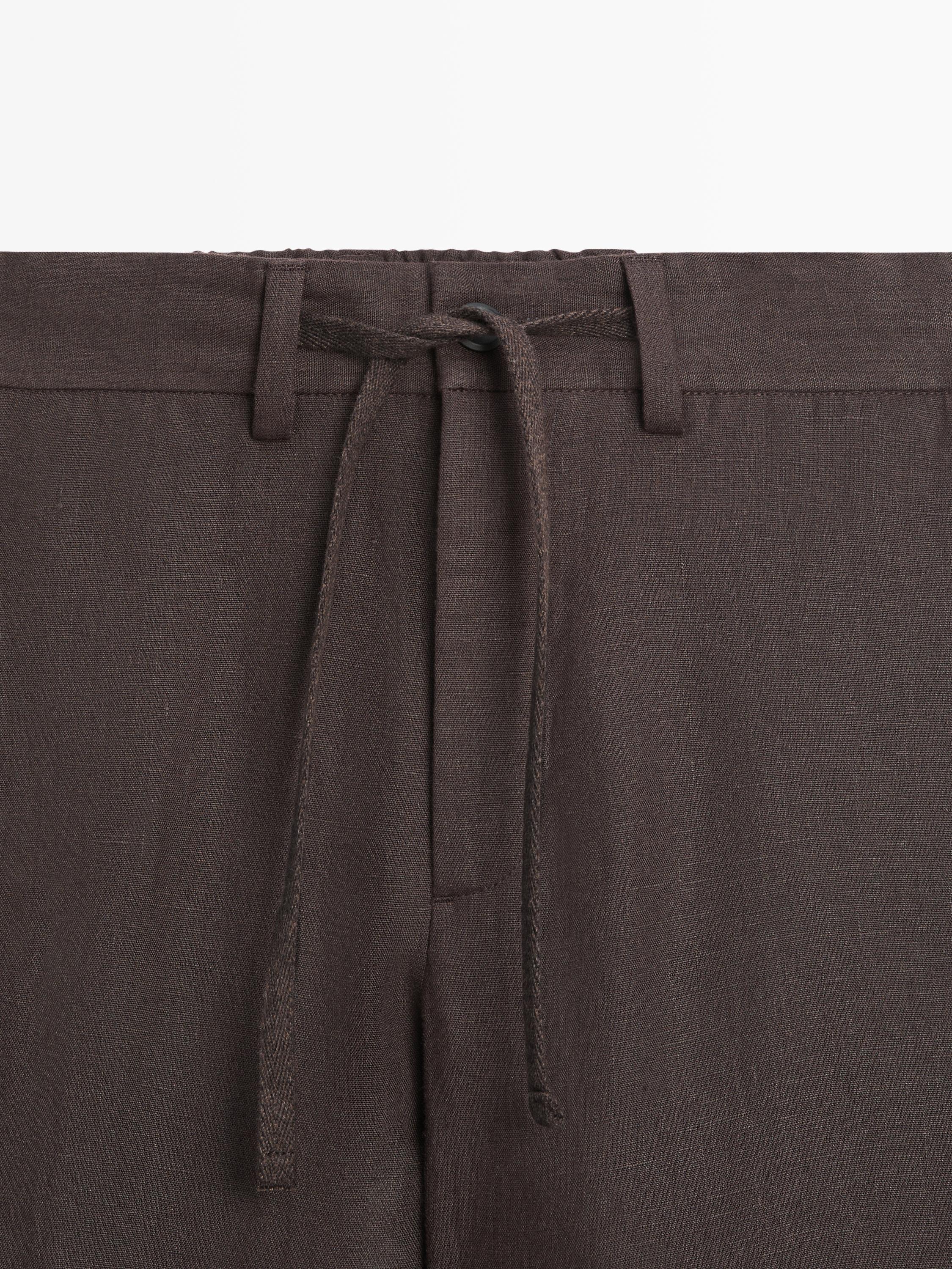 Total look linen trousers — Chocolate