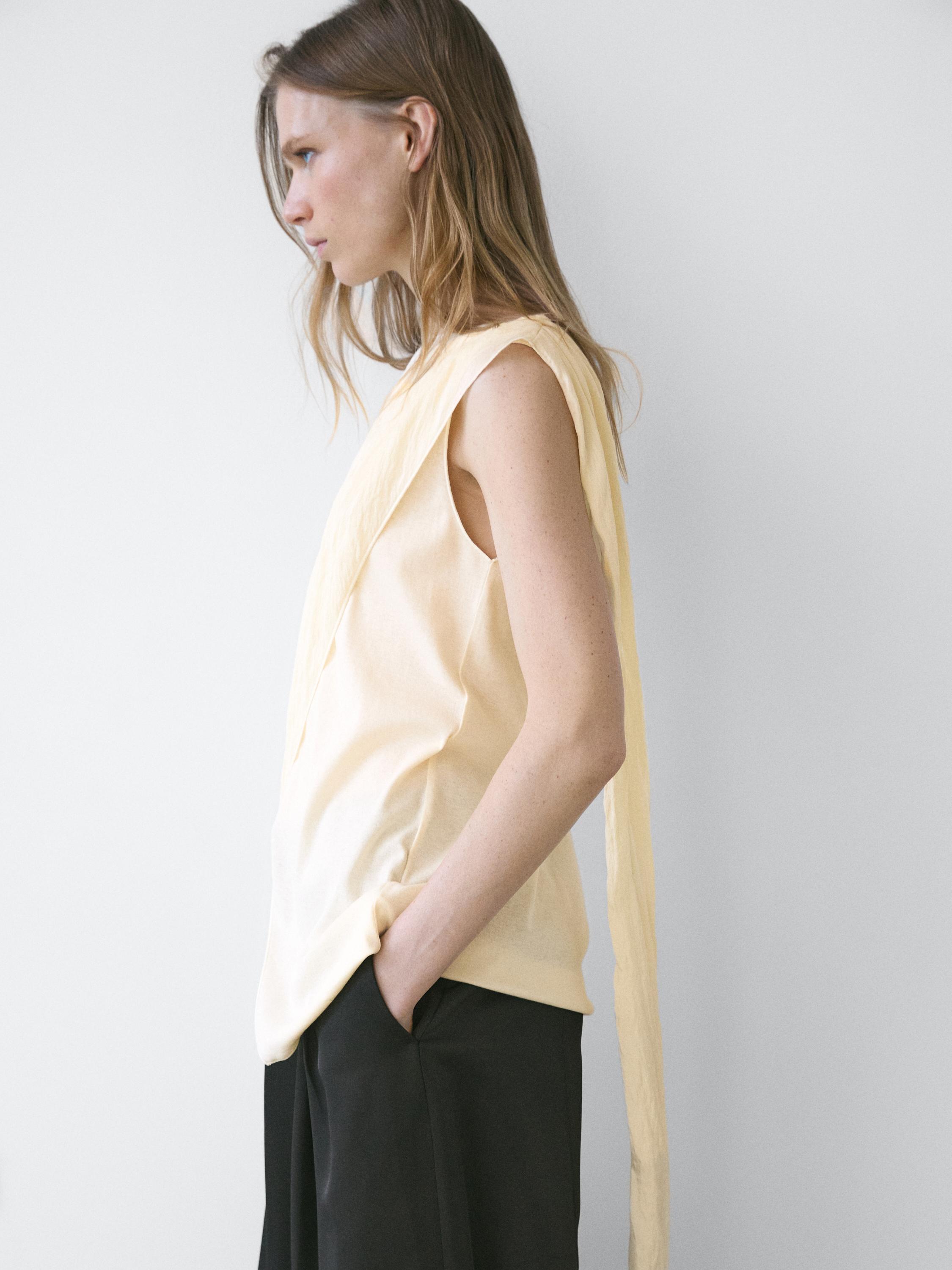 Crossover top with shoulder scarf detail — CREAM