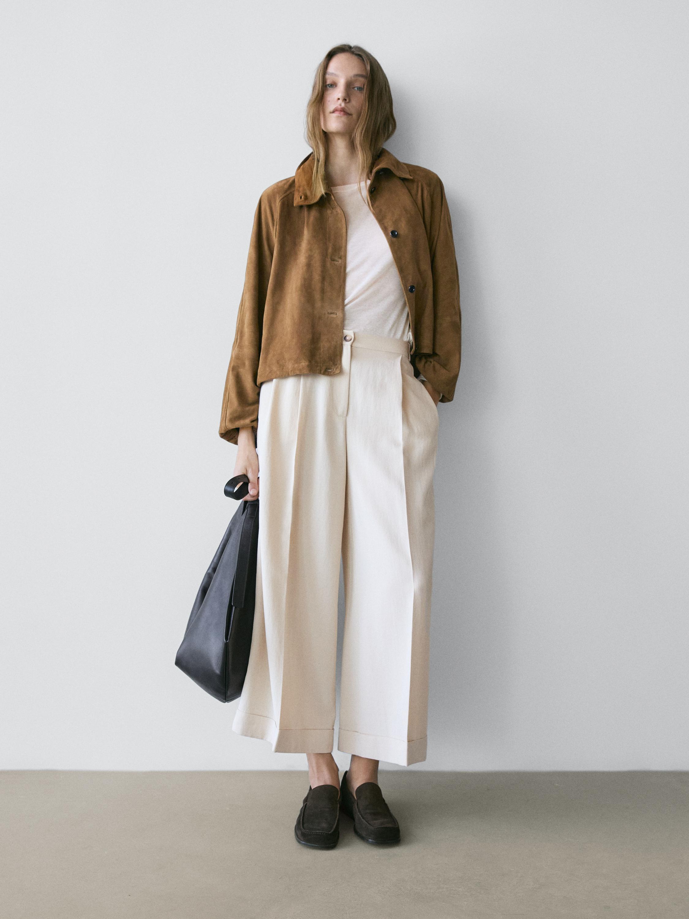Flowing trousers with turn-up hems — CREAM