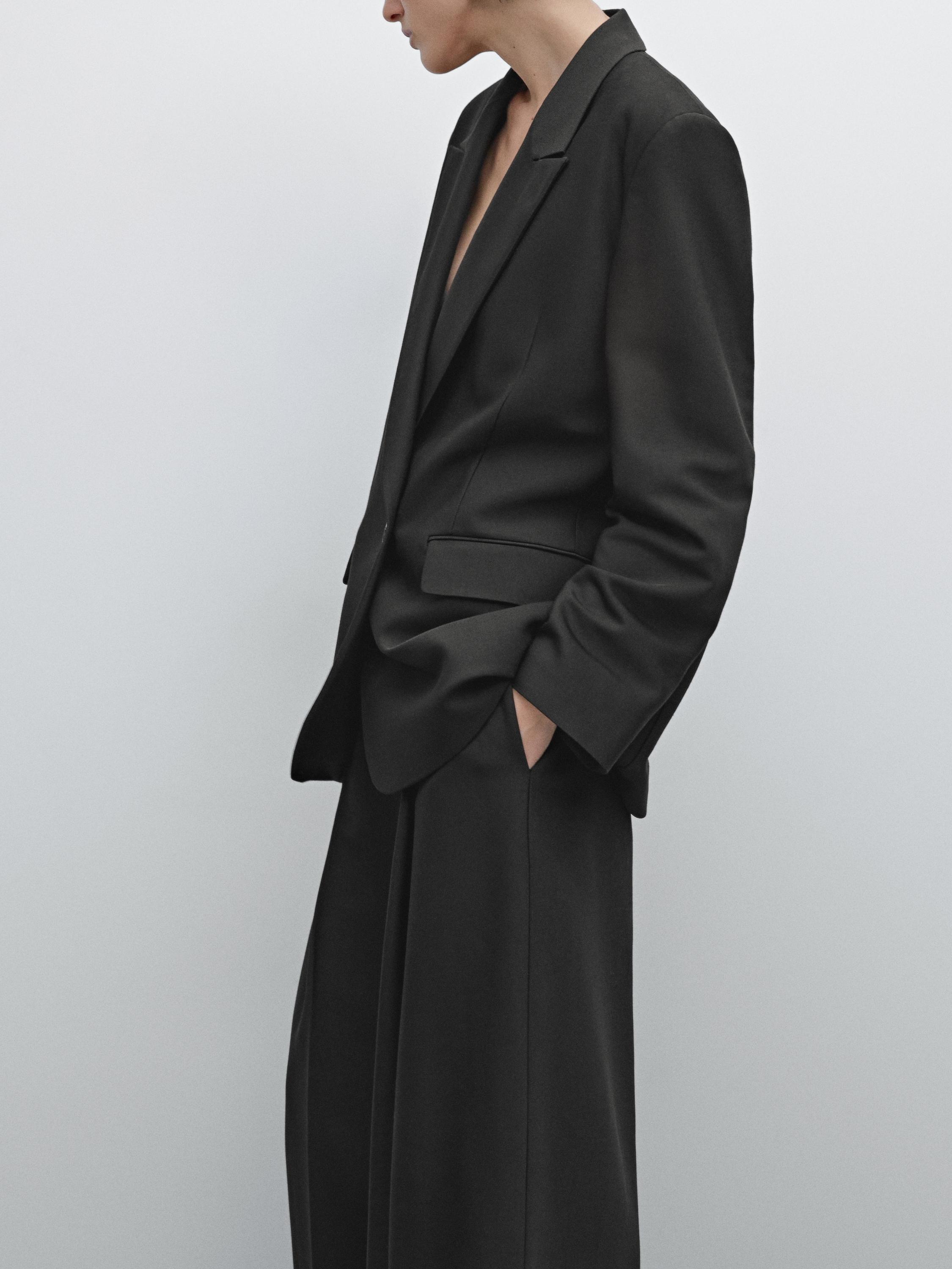 Americana de vestit solapes
