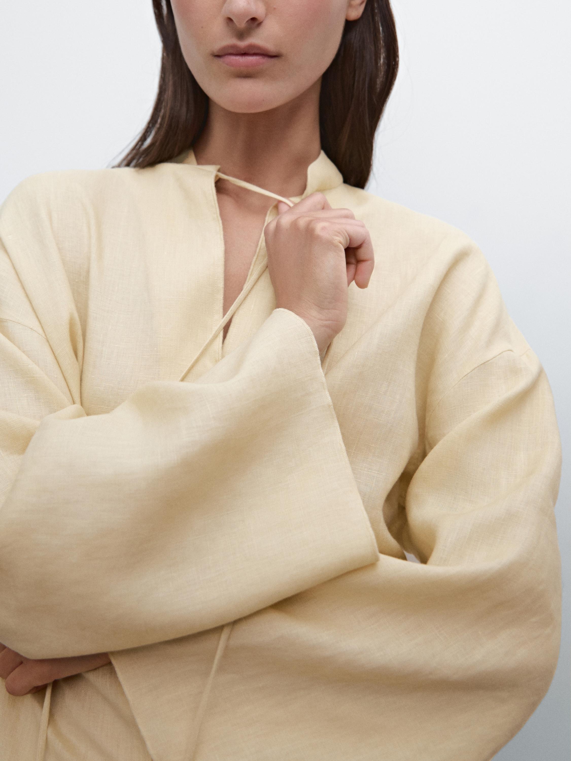 Flowing shirt with rhinestone cord detail