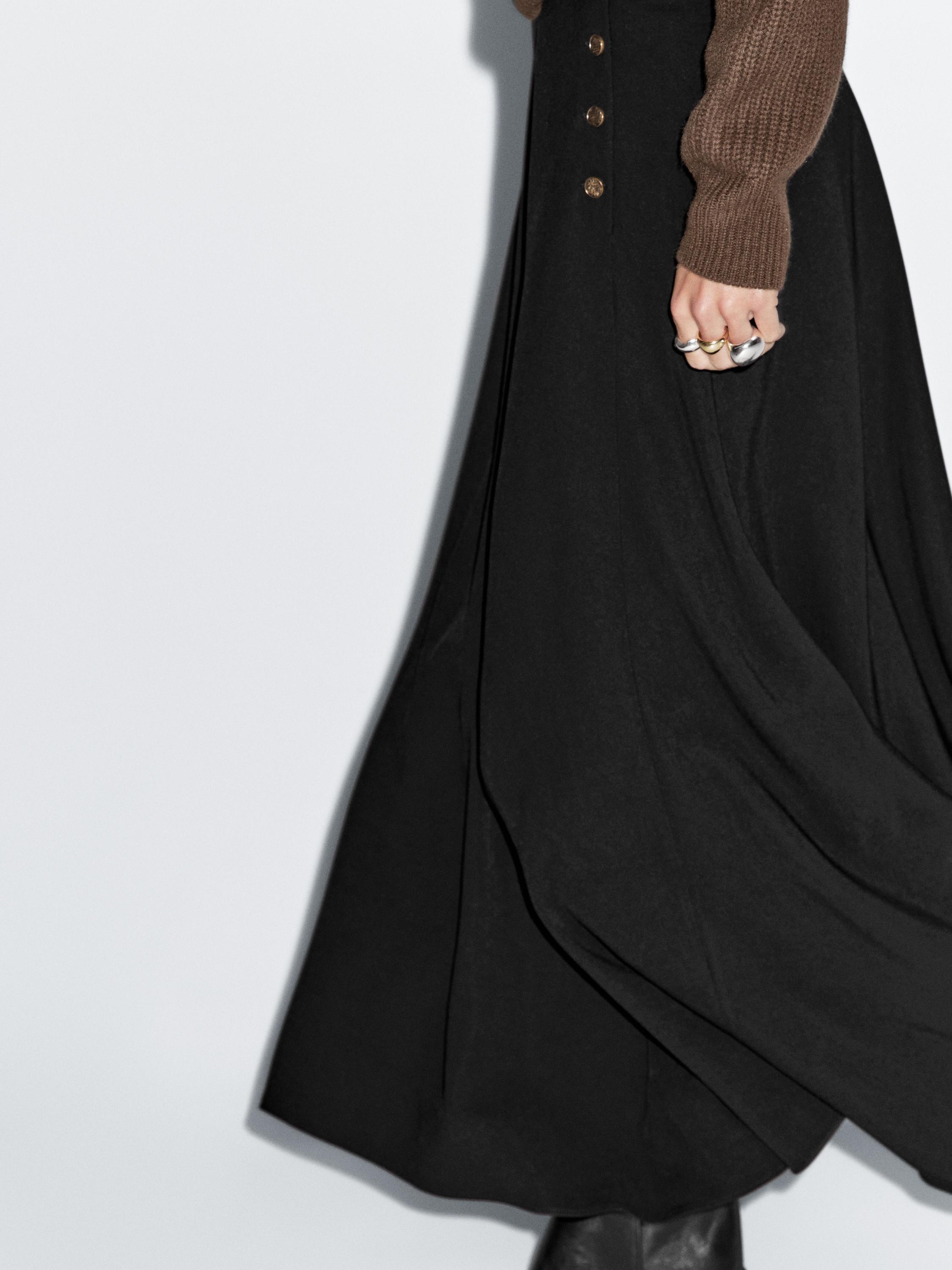 Long flared skirt with button details