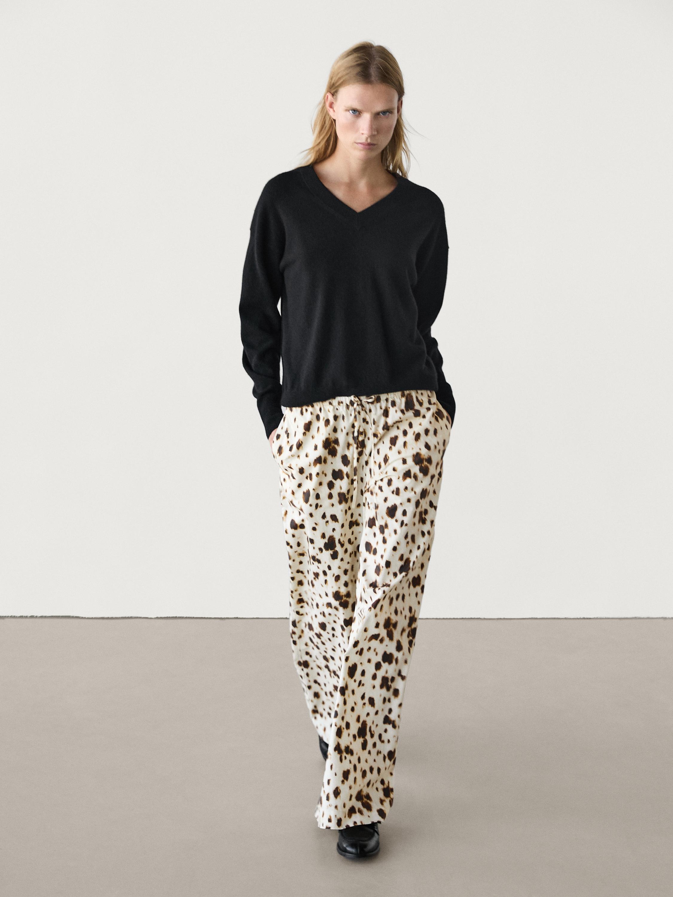 Wide-leg printed trousers with drawstring detail