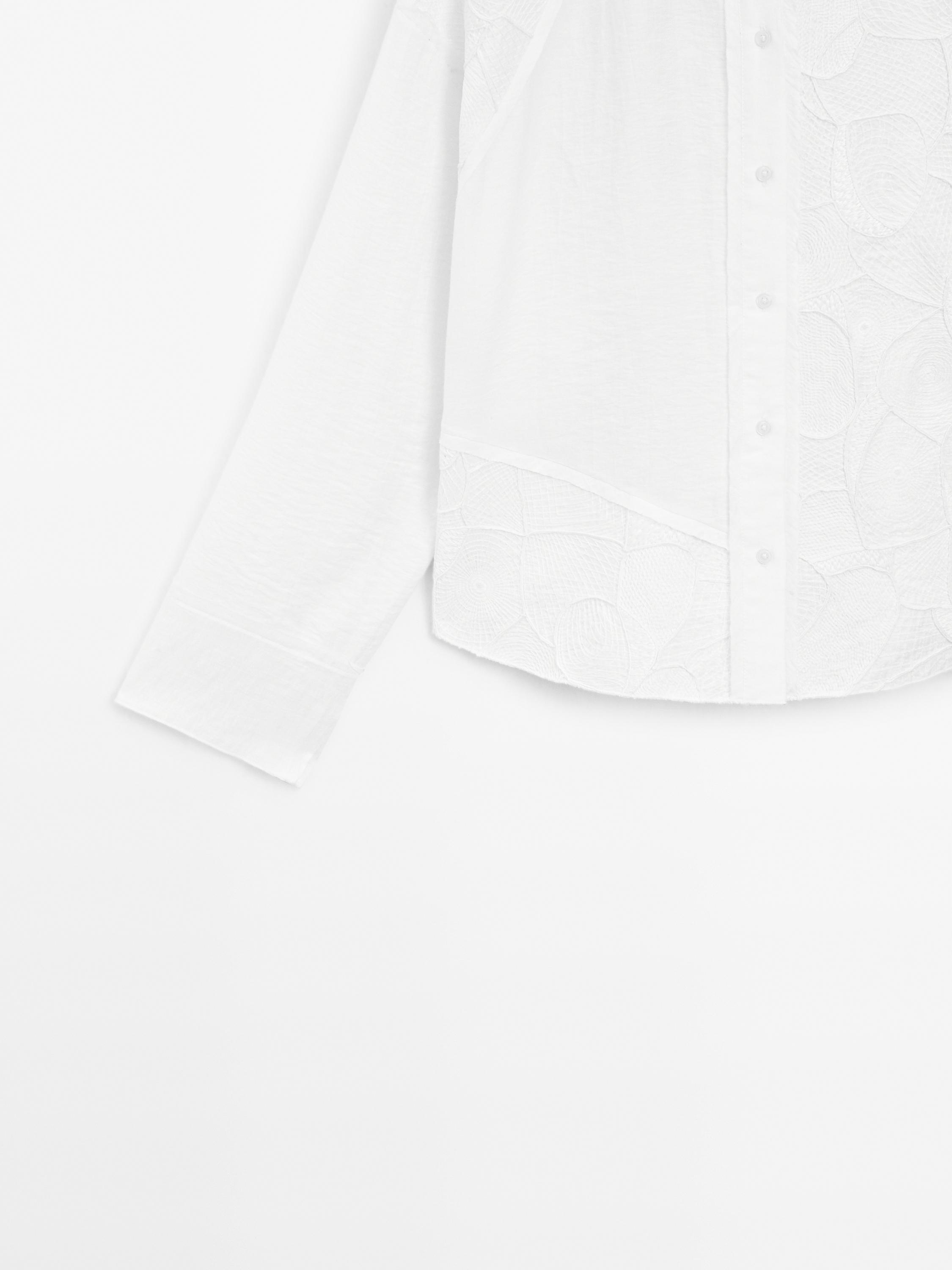 Flowing shirt with embroidered detail