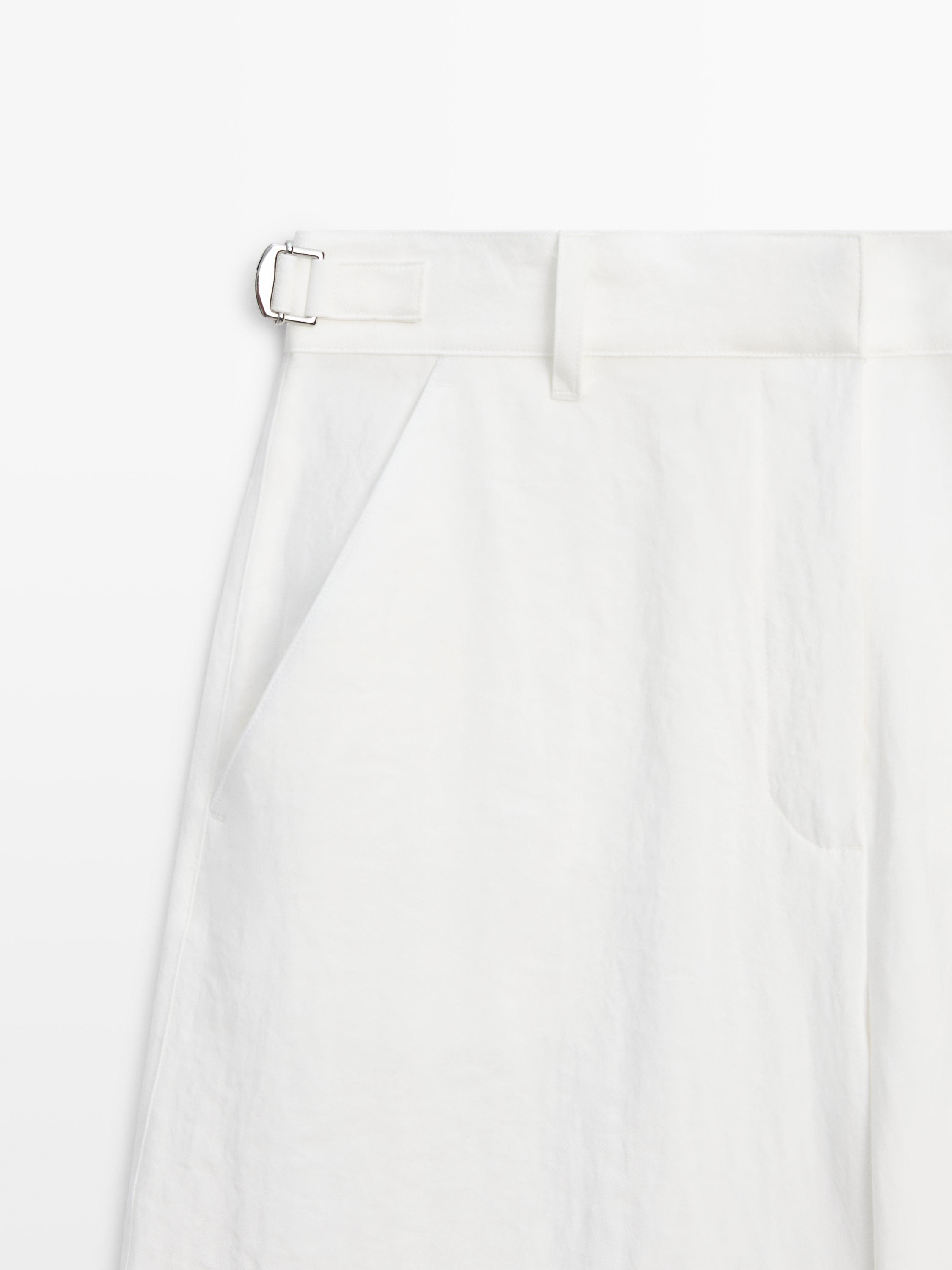 Flowing trousers with buckles — WHITE
