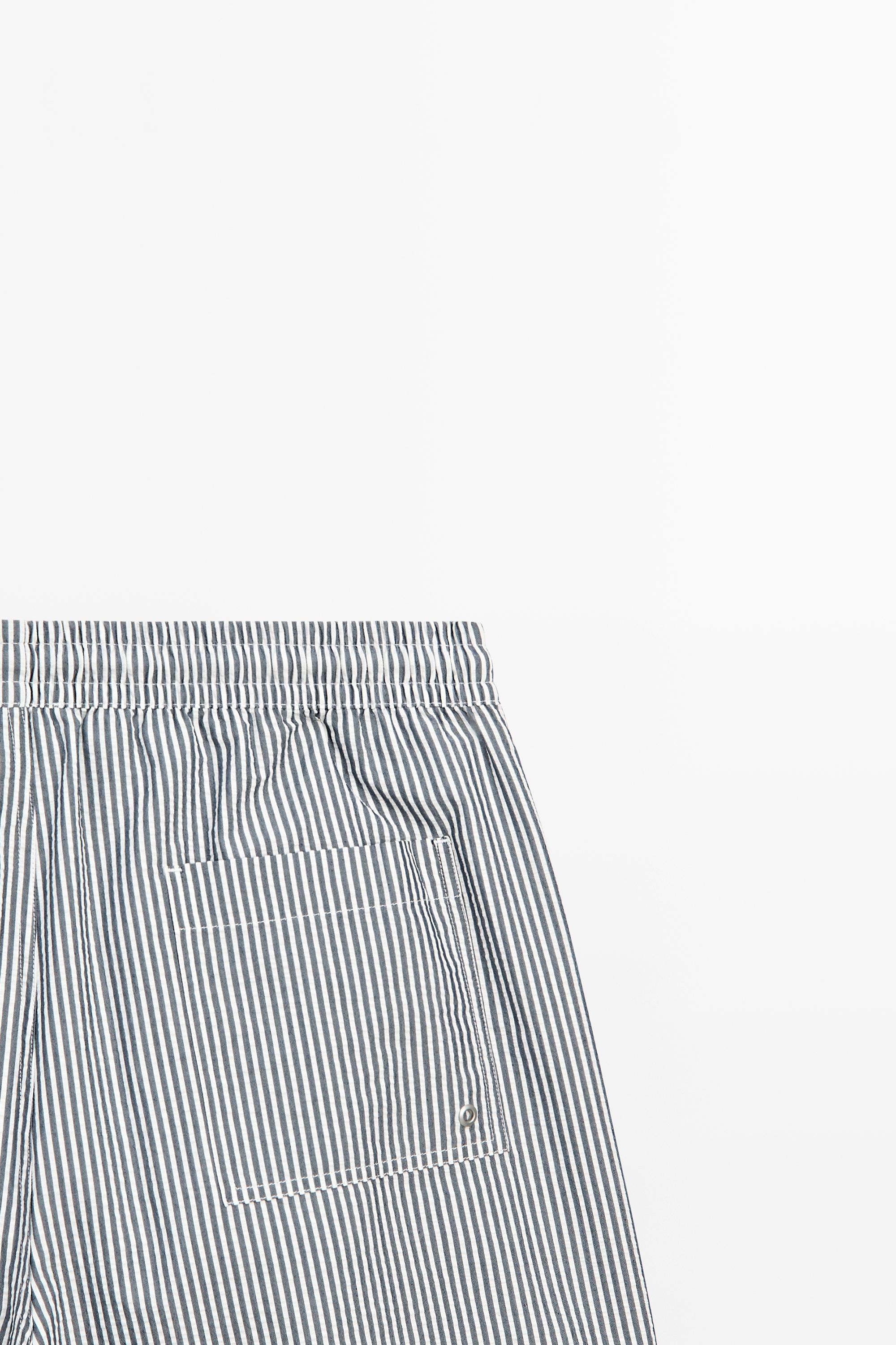 Swimming trunks with striped details — NAVY BLUE