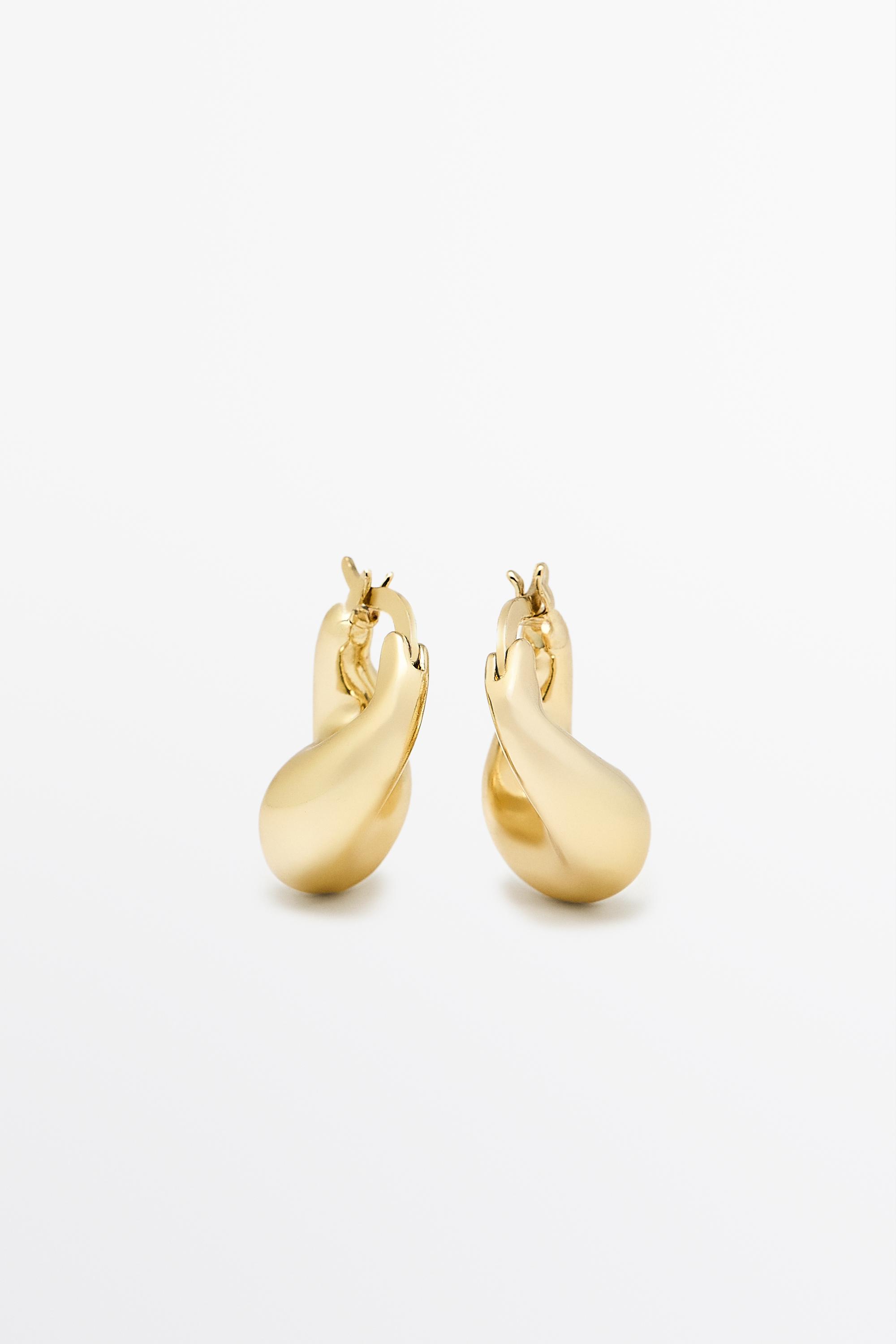 Voluminous hoop earrings — GOLDEN